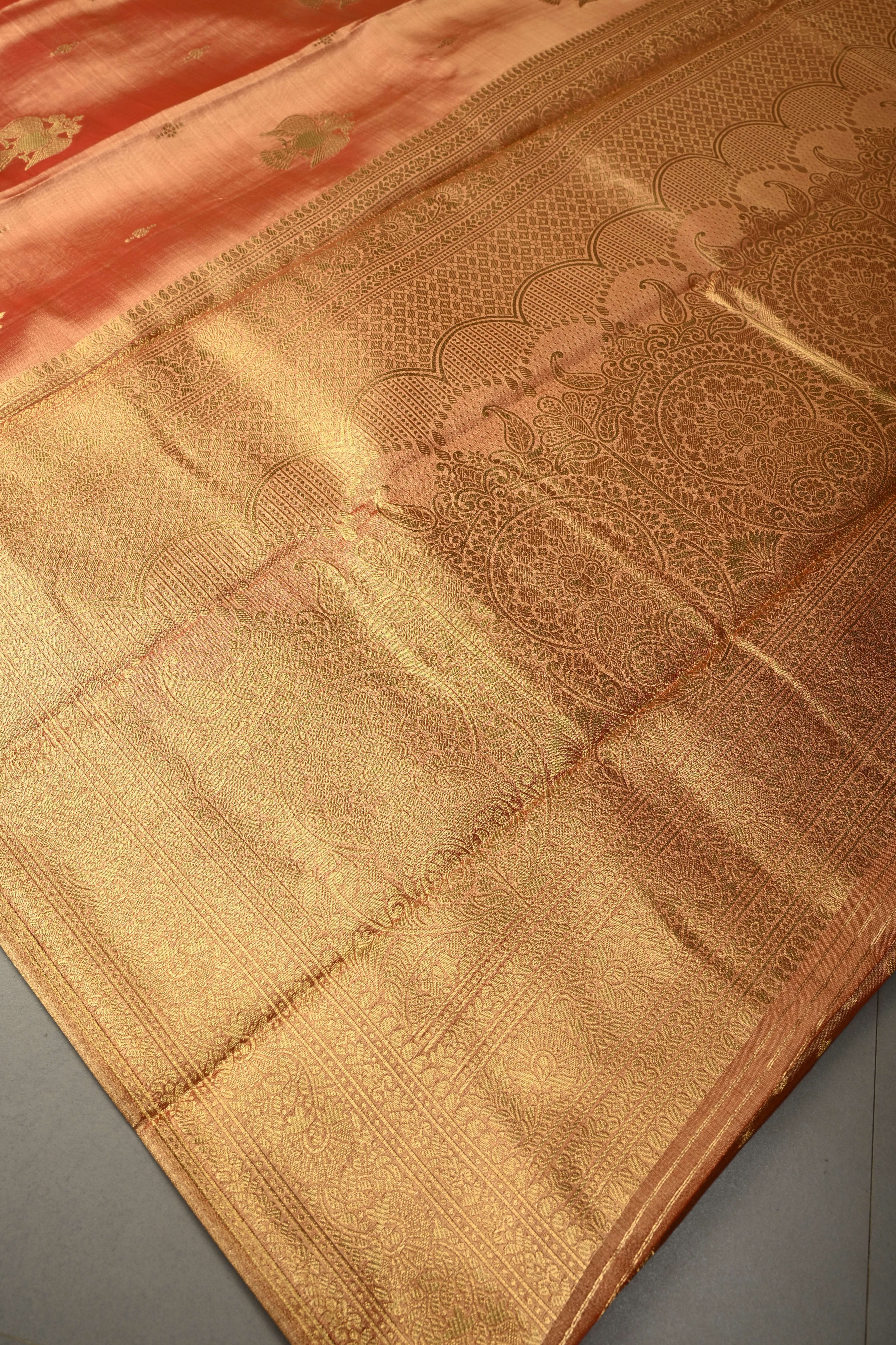 Reddish-Gold Kanchi Tissue Semi Silk Saree with Gandaberunda Zari Buttas and Zari Border | Shobitam