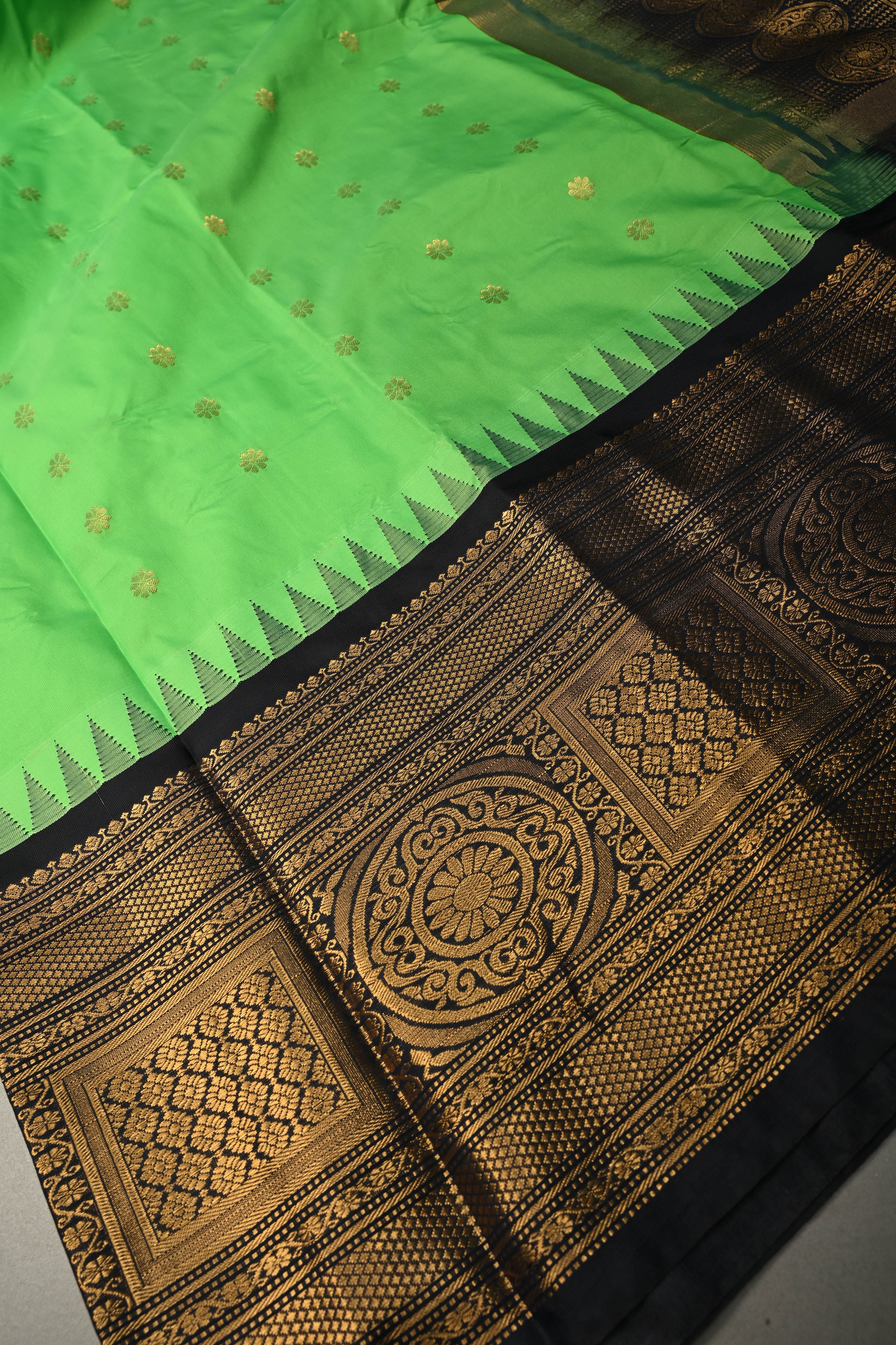Green Semi Gadwal Silk Saree with Floral Zari Buttas and Contrast Zari Border | Shobitam
