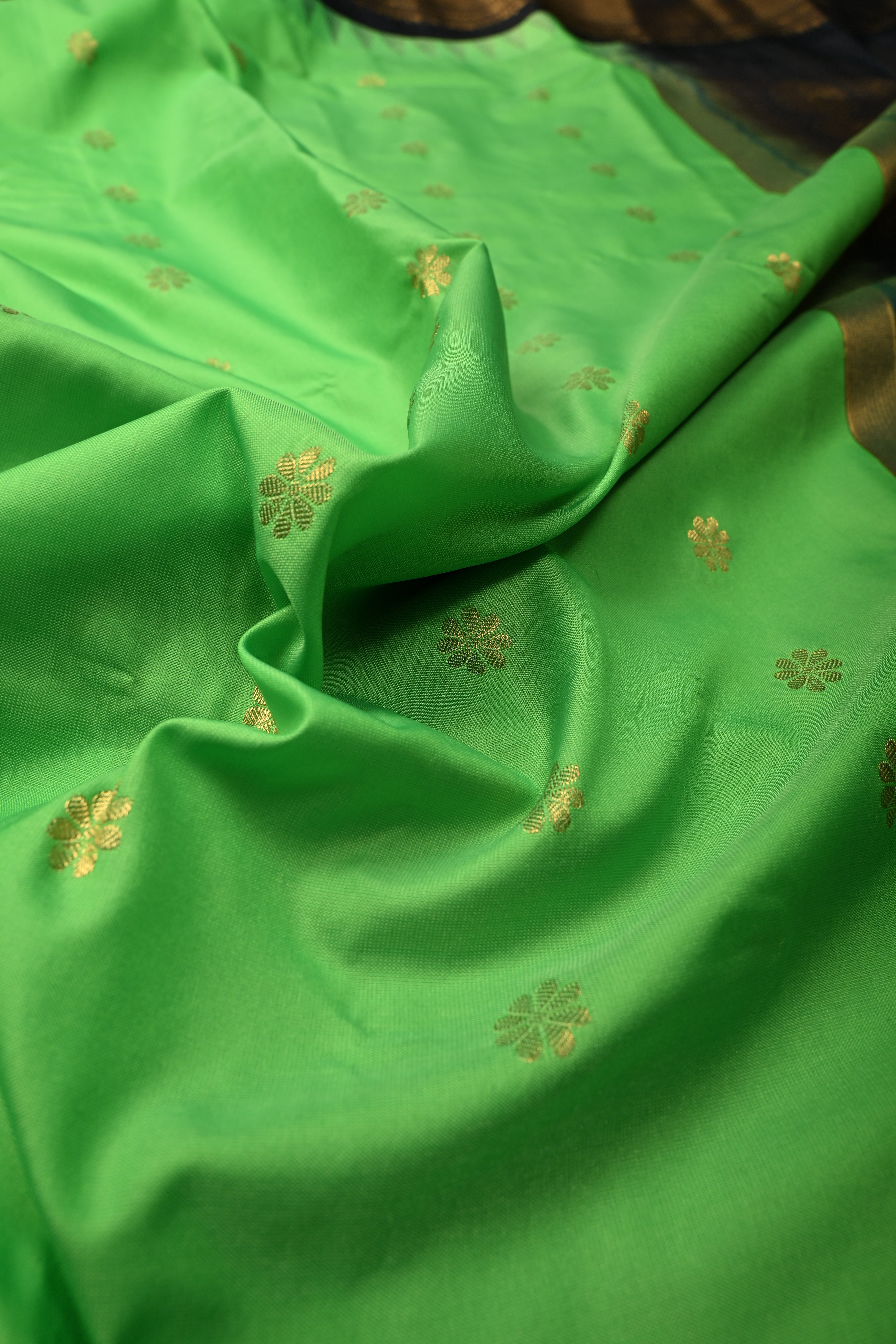 Green Semi Gadwal Silk Saree with Floral Zari Buttas and Contrast Zari Border | Shobitam