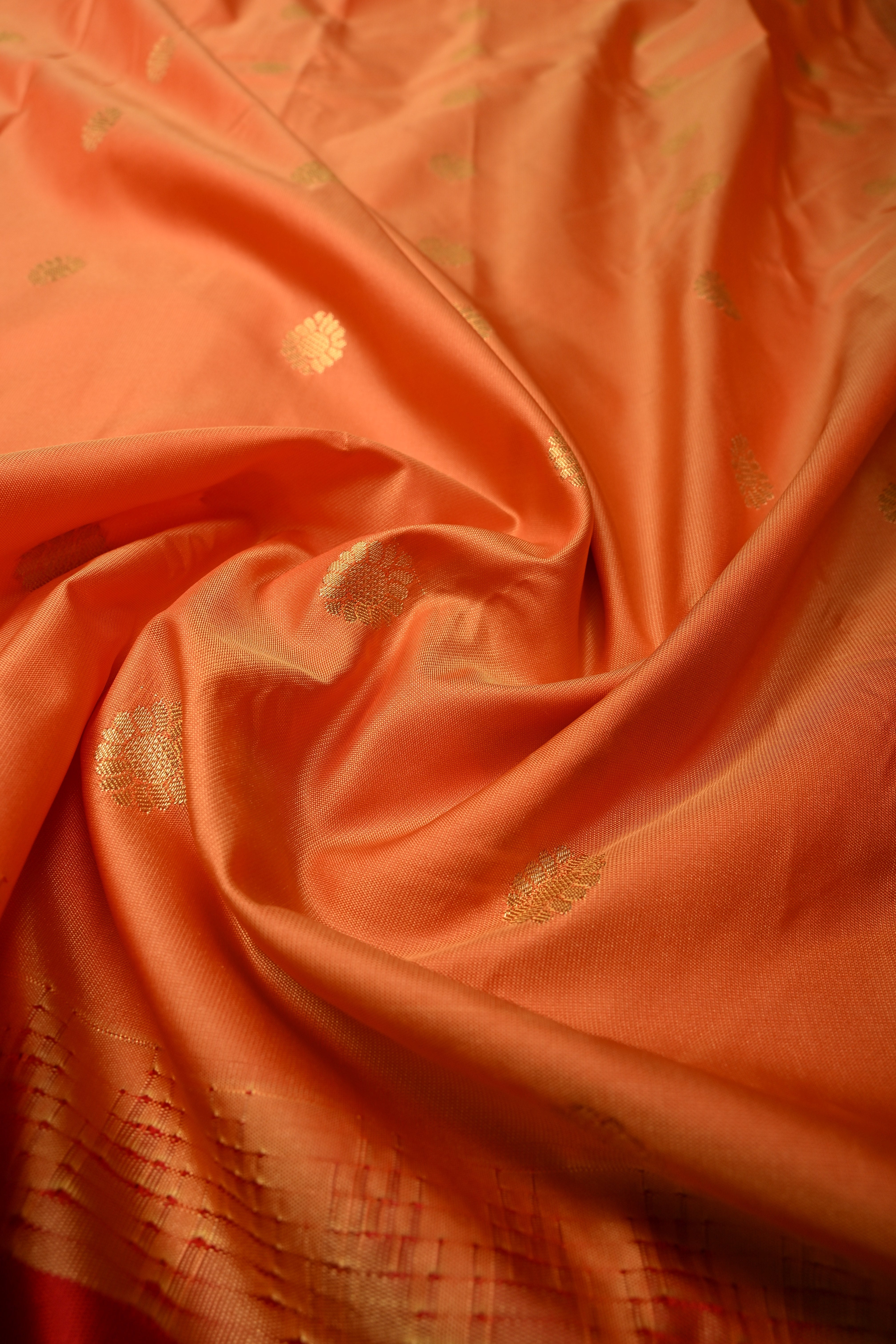 Orange Semi Gadwal Silk Saree with Floral Zari Buttas and Contrast Zari Border | Shobitam