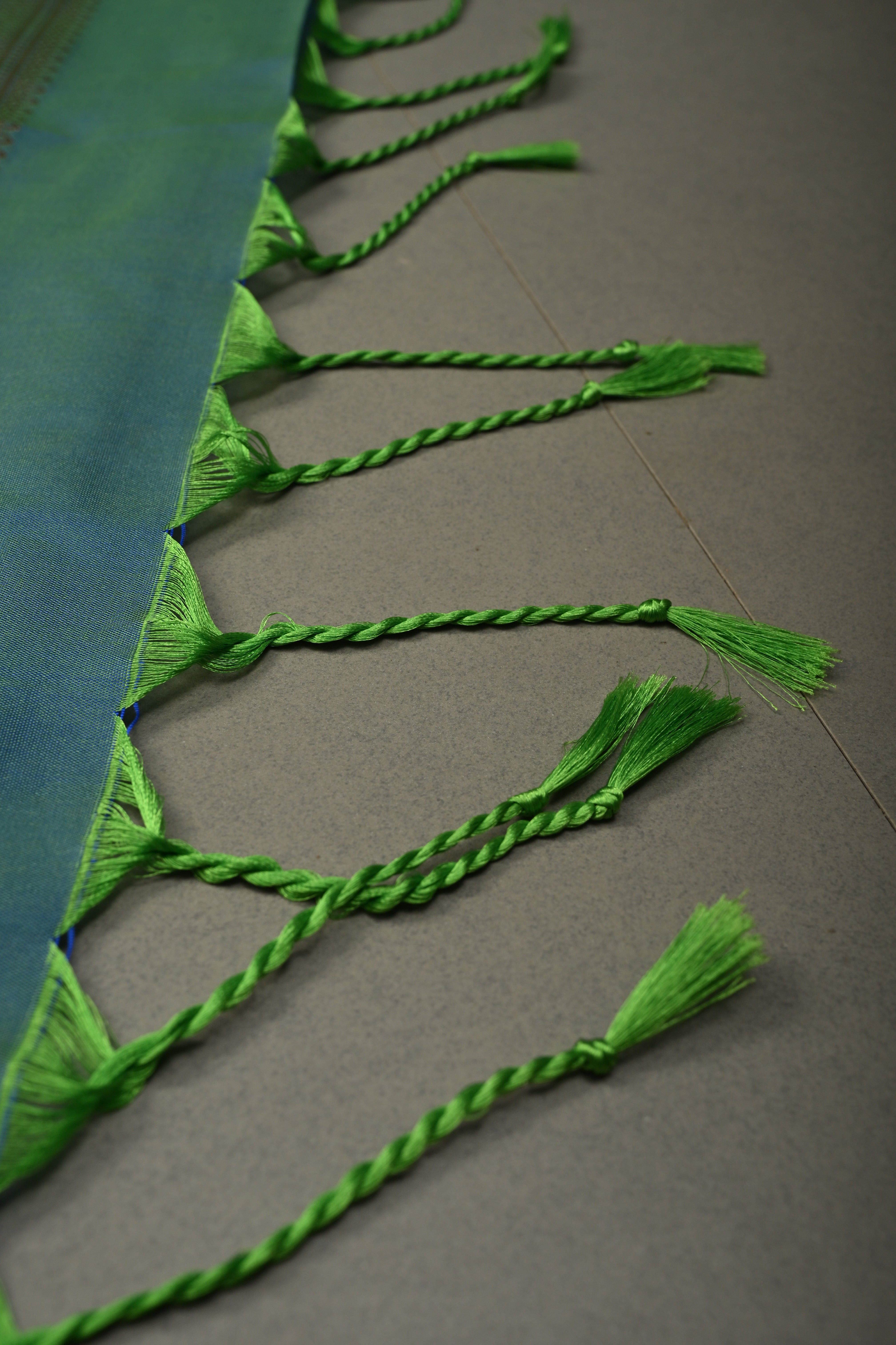 Pink-Green Kanchi Semi Silk Saree with Floral Zari Buttas and Gold-Silver Motifs on Border | Shobitam