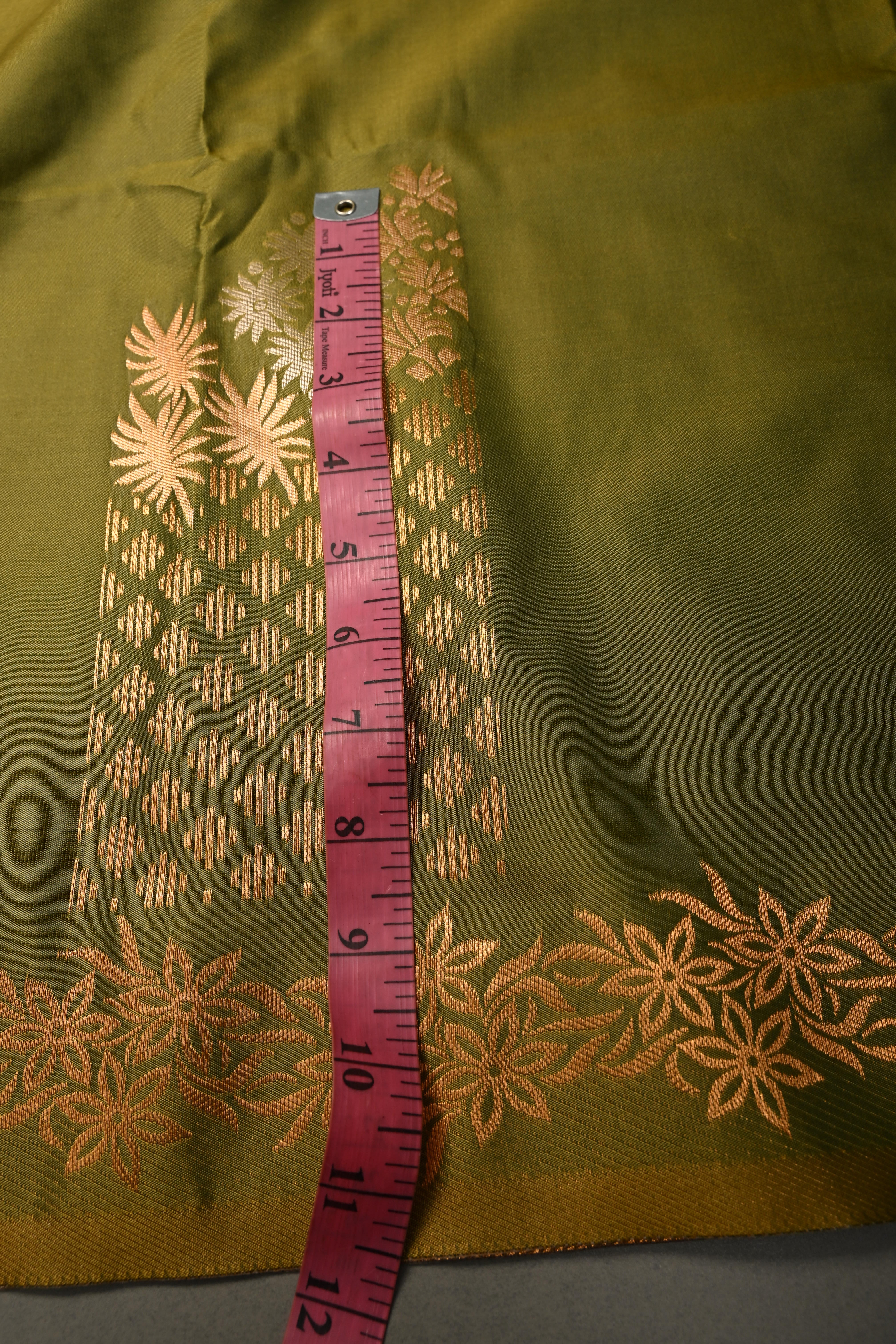 Henna Green Kanchi Semi Silk Saree with Floral Zari Buttas and Gold-Silver Motifs on Border | Shobitam