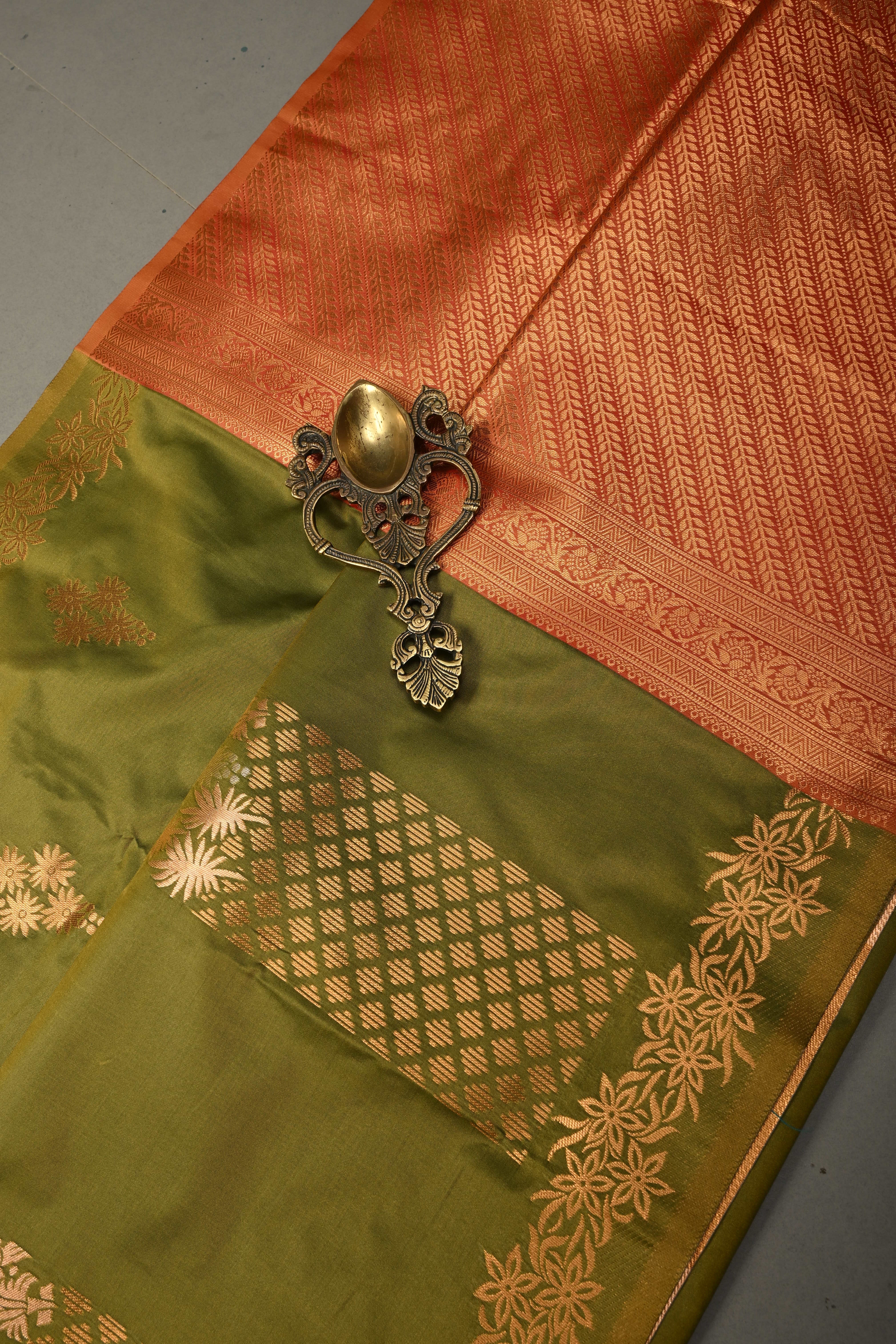 Henna Green Kanchi Semi Silk Saree with Floral Zari Buttas and Gold-Silver Motifs on Border | Shobitam
