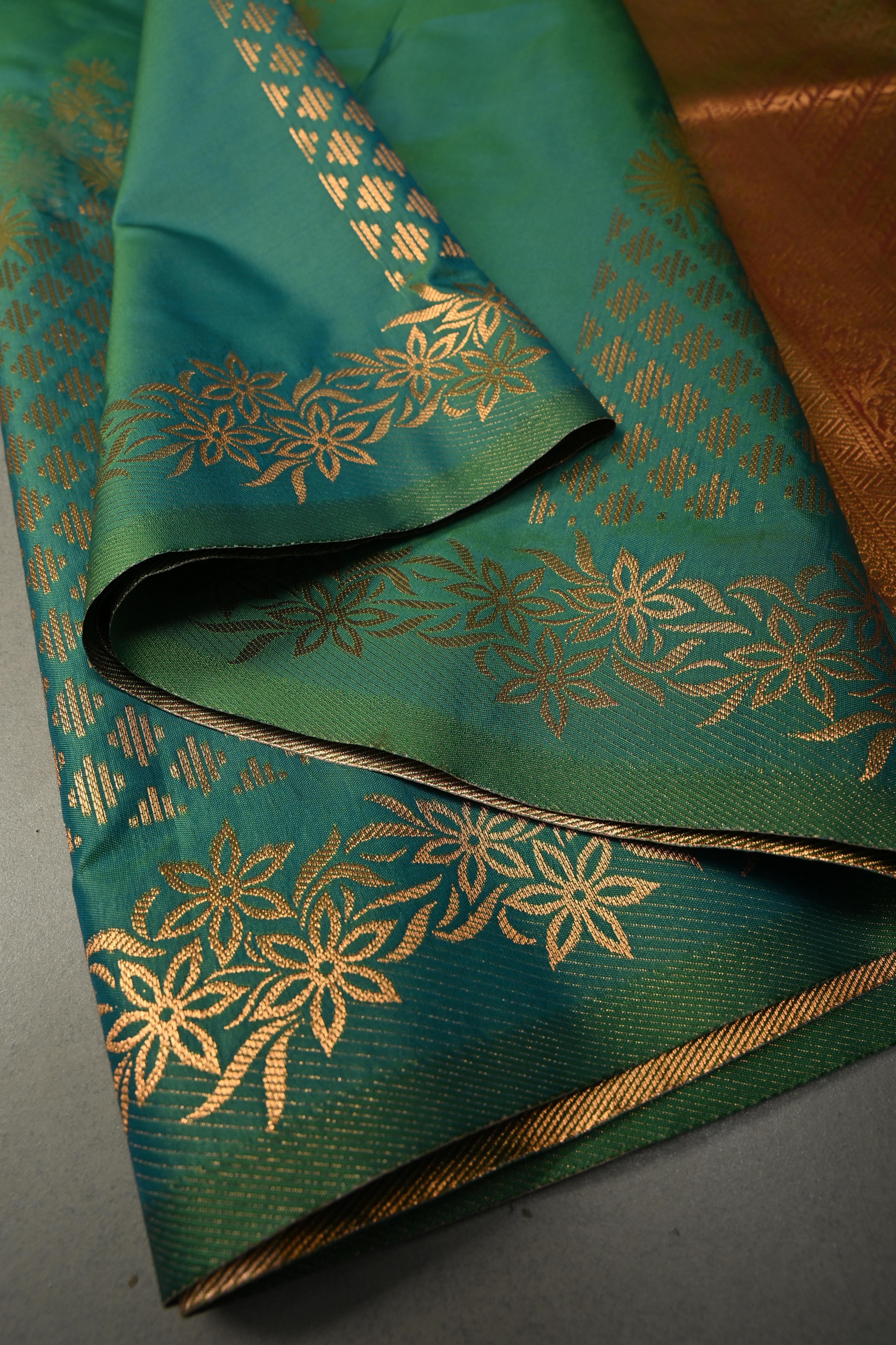 Green Dual tone Kanchi Semi Silk Saree with Floral Zari Buttas and Gold-Silver Motifs on Border | Shobitam