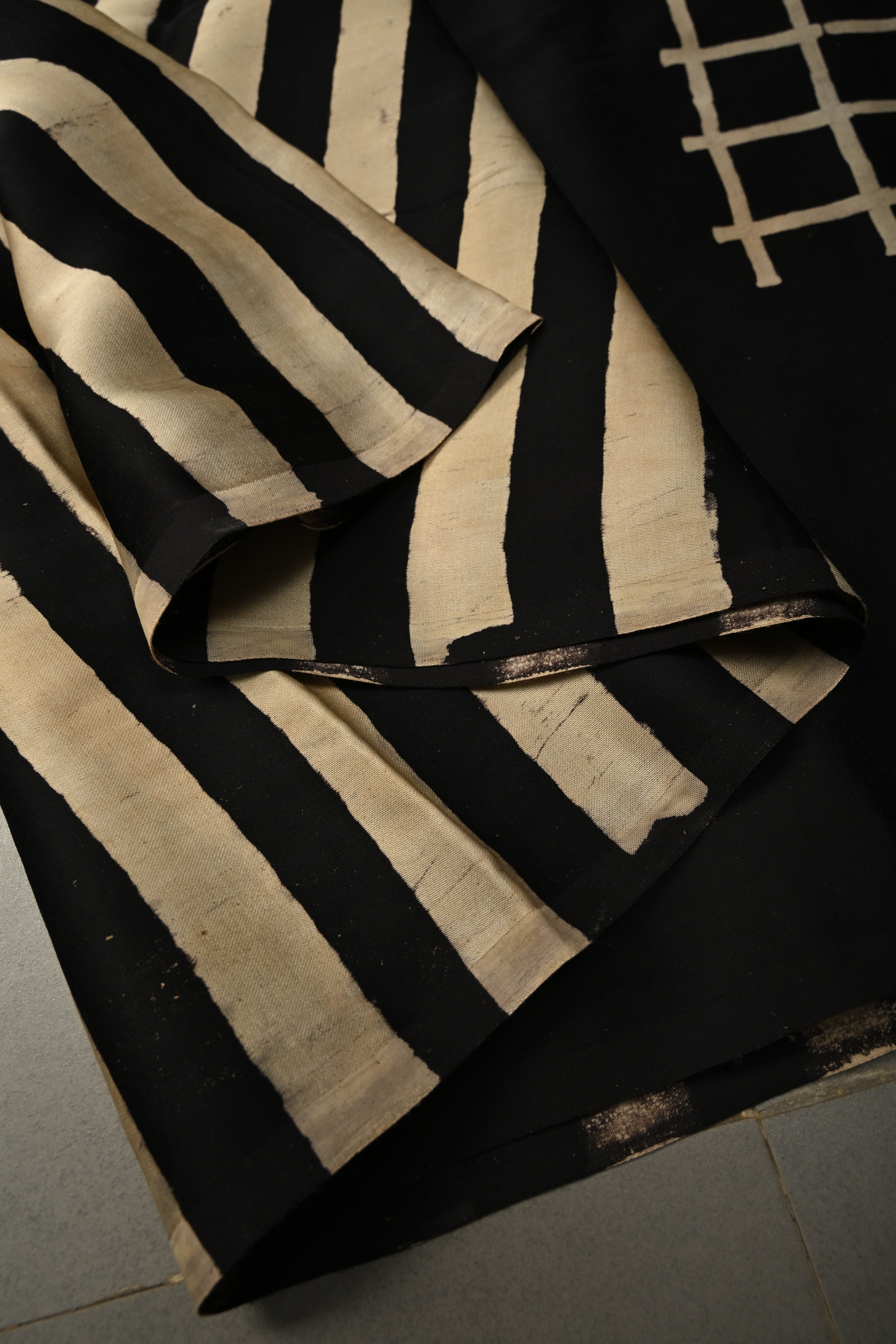 Black-White Borderless Modal Silk Saree with Stripes Hand Block Print and Checks Pattern Pallu | Shobitam