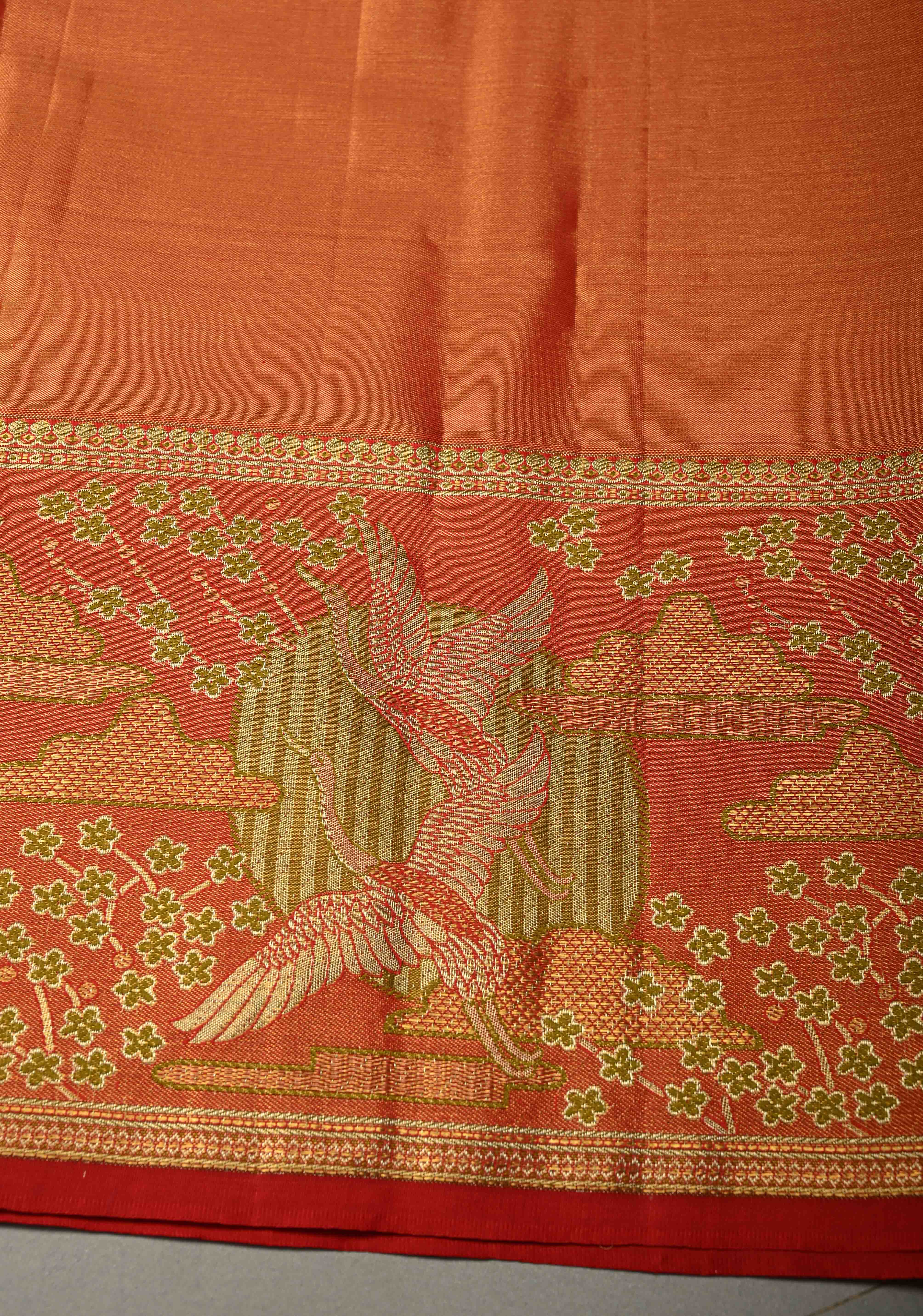Ollive Green Kanjivaram Tissue Semi Silk Saree with Meenakari Floral Brocade Jaal and Contrast Zari Border | Shobitam