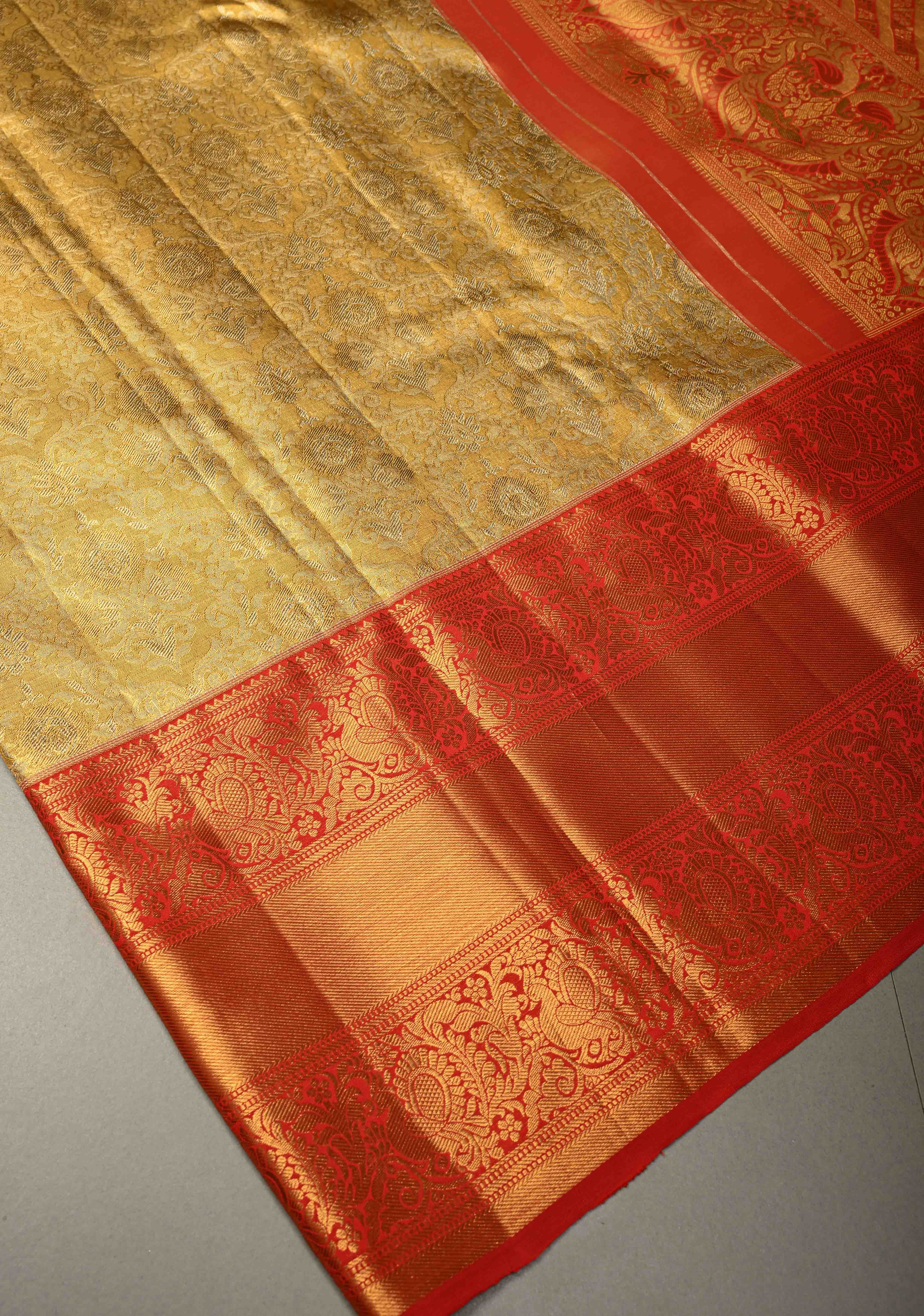 Exquisite Gold Kanjivaram Tissue Semi Silk Saree with Meenakari Floral Brocade Jaal and Contrast Zari Border | Shobitam