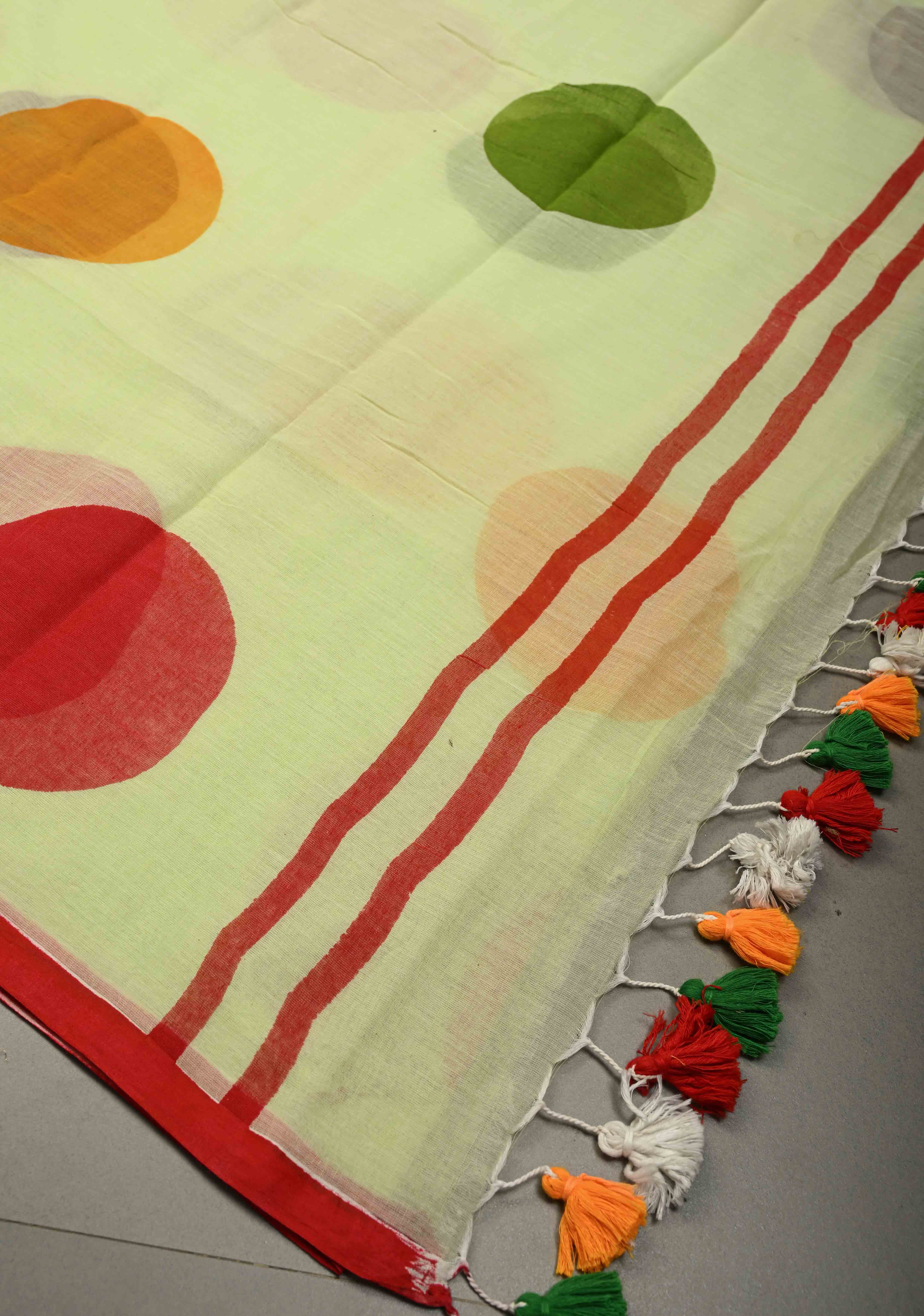 Tea Green Mulmul Cotton Saree with Hand Painted Circle Buttas and Multihue Tassels, No Blouse Piece |Shobitam