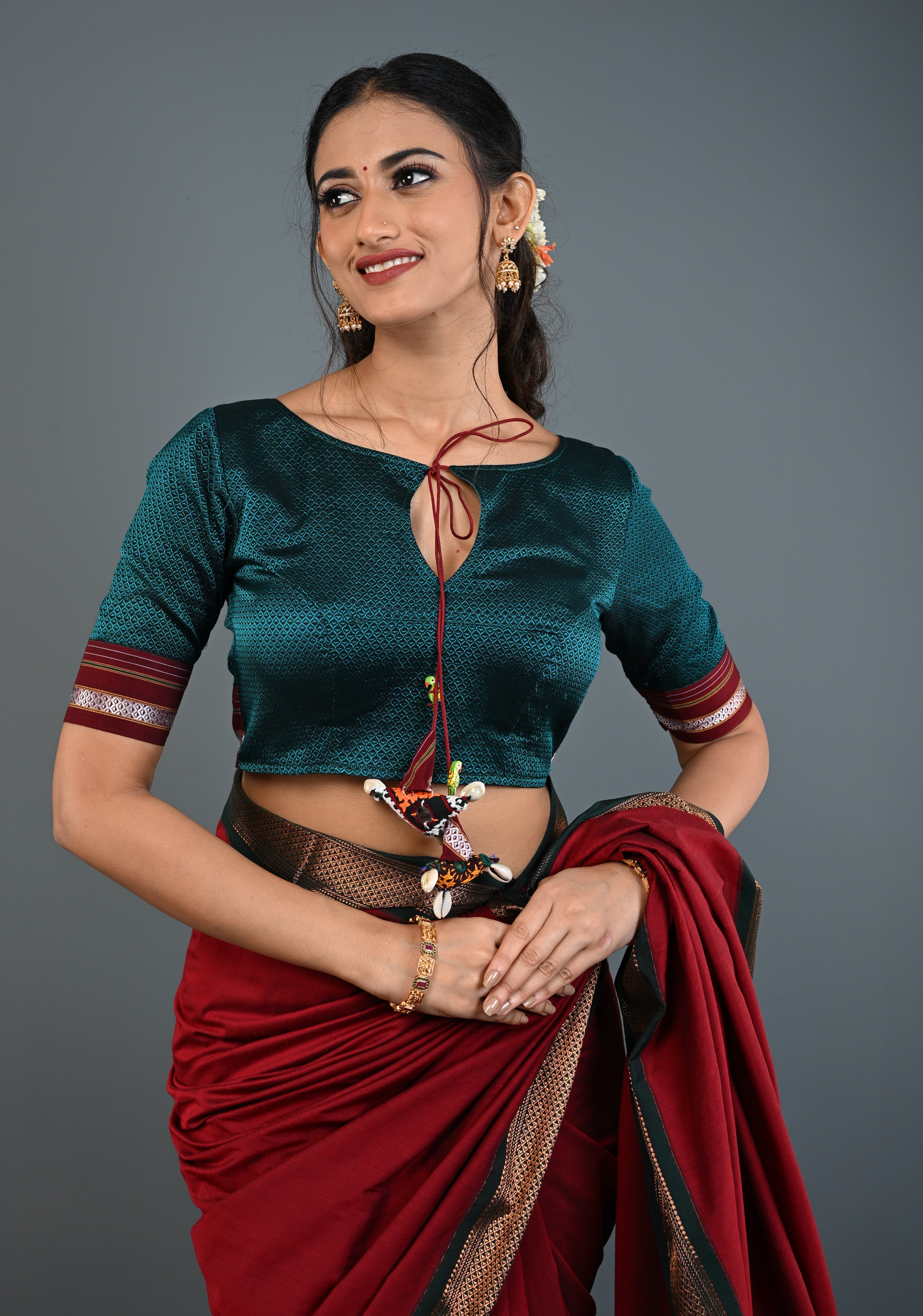 Teal-Black Khana Silk Blouse with Keyhole Neck and Cowrie Shells Tassels, Customizable, Made to Order | Shobitam