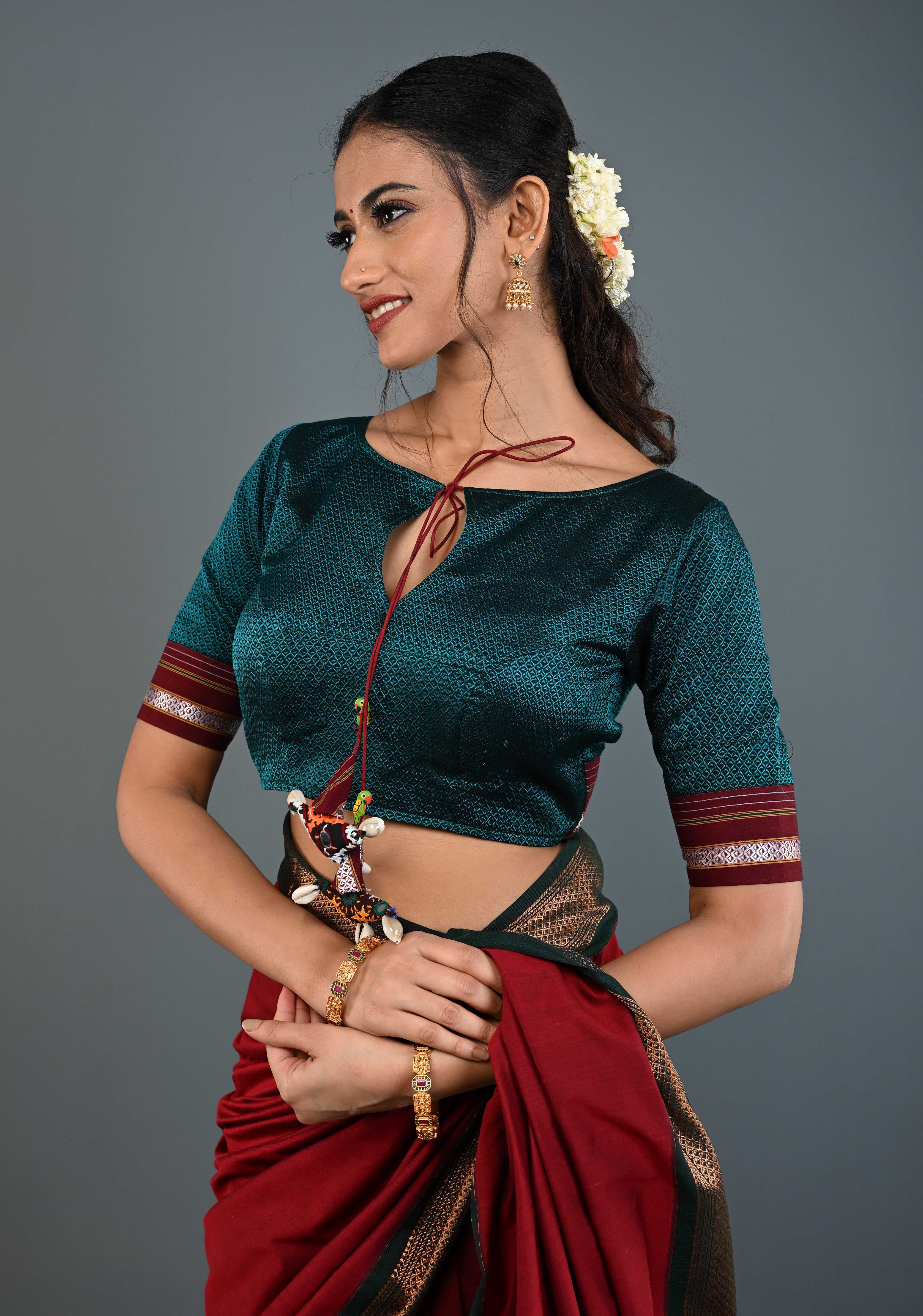 Teal-Black Khana Silk Blouse with Keyhole Neck and Cowrie Shells Tassels, Customizable, Made to Order | Shobitam