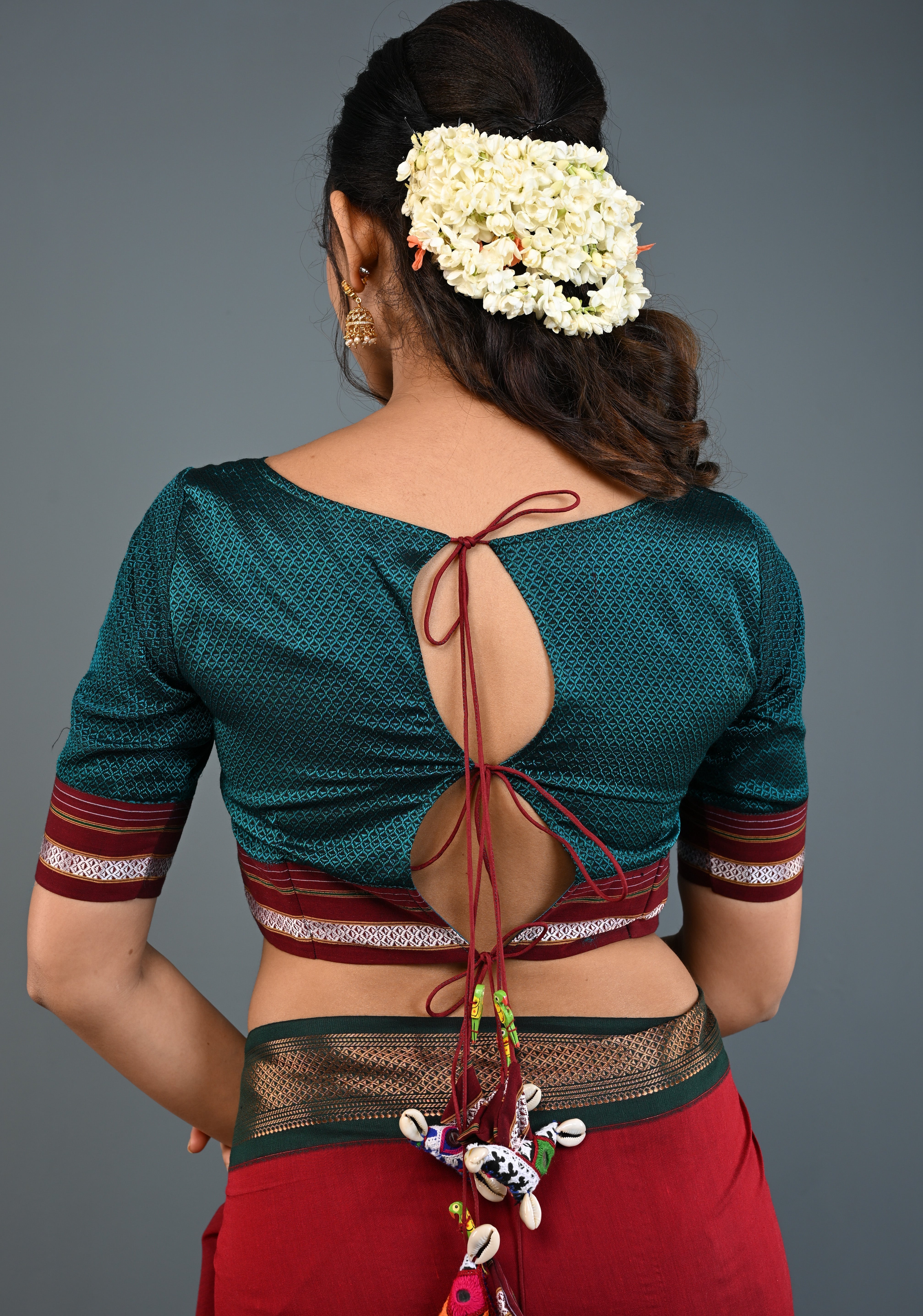Teal-Black Khana Silk Blouse with Keyhole Neck and Cowrie Shells Tassels, Customizable, Made to Order | Shobitam