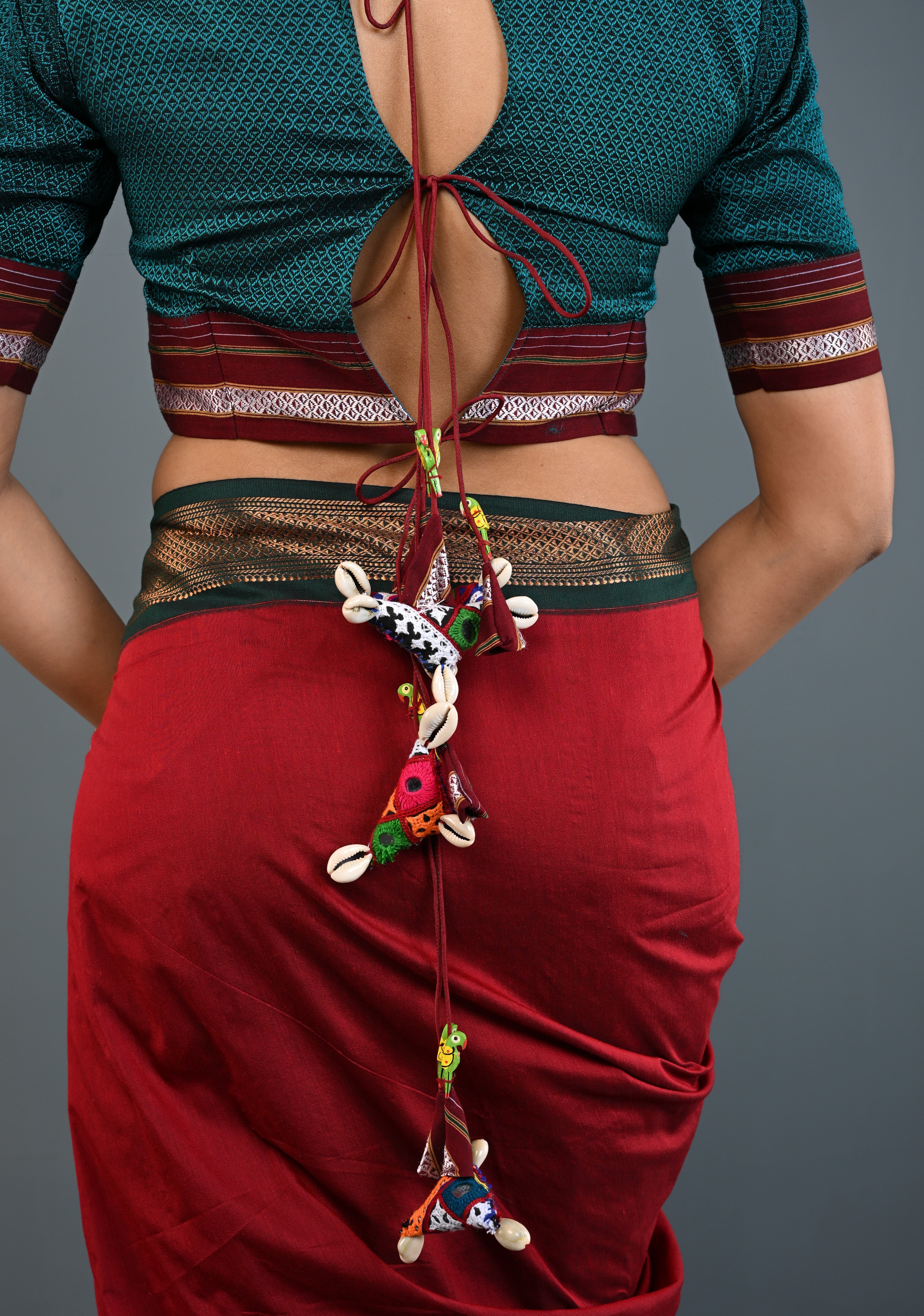 Teal-Black Khana Silk Blouse with Keyhole Neck and Cowrie Shells Tassels, Customizable, Made to Order | Shobitam