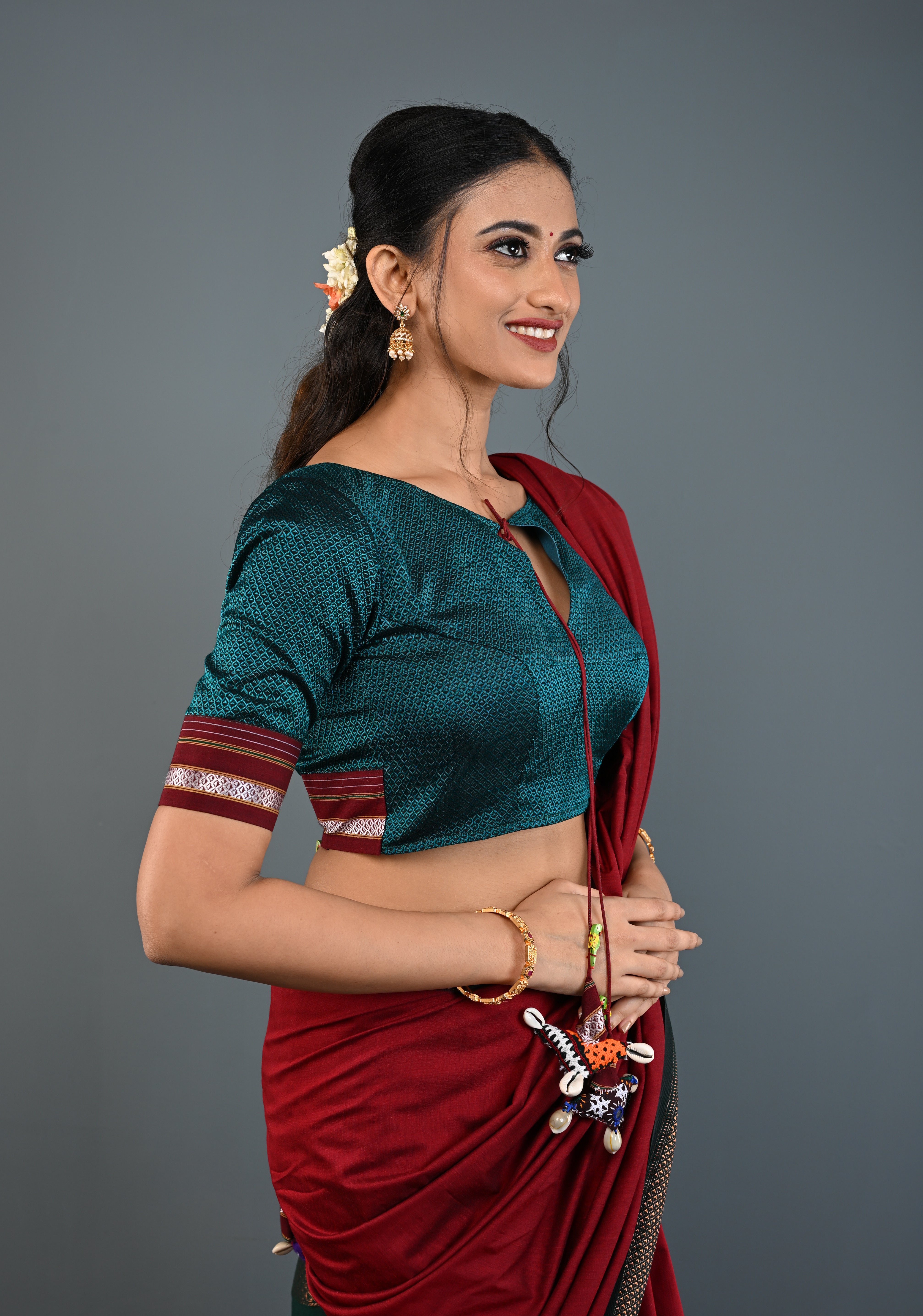 Teal-Black Khana Silk Blouse with Keyhole Neck and Cowrie Shells Tassels, Customizable, Made to Order | Shobitam