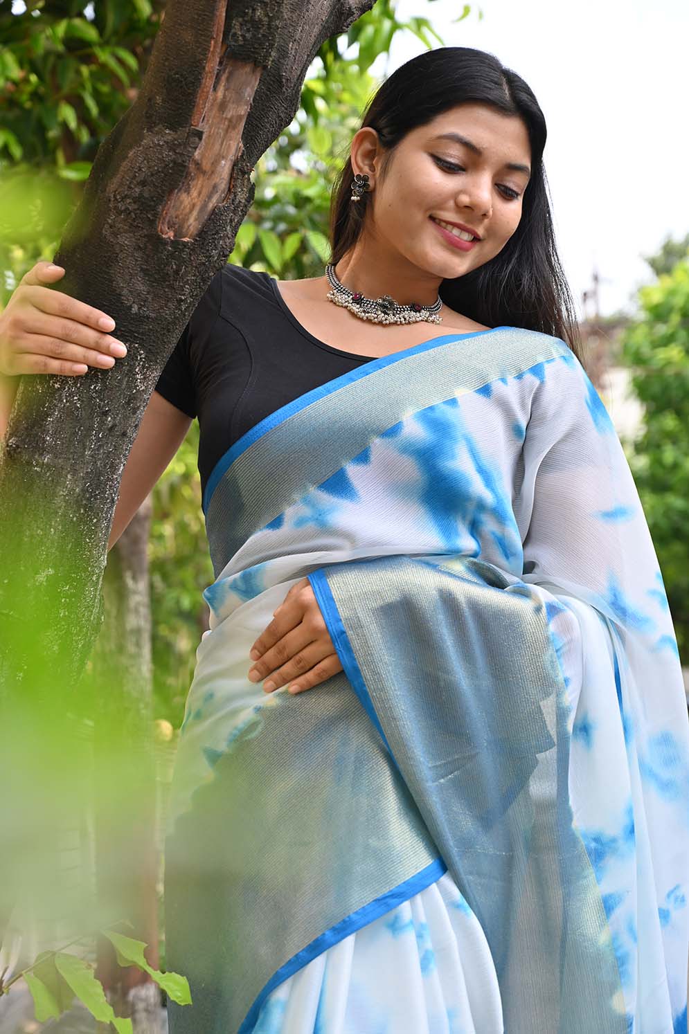 Find Blue saree with flowered blouse,............ Marble chiffon saree with  Separate blouse. by Elite- Deal near me | Vaniyambadi, Vellore, Tamil Nadu  | Anar B2B Business App