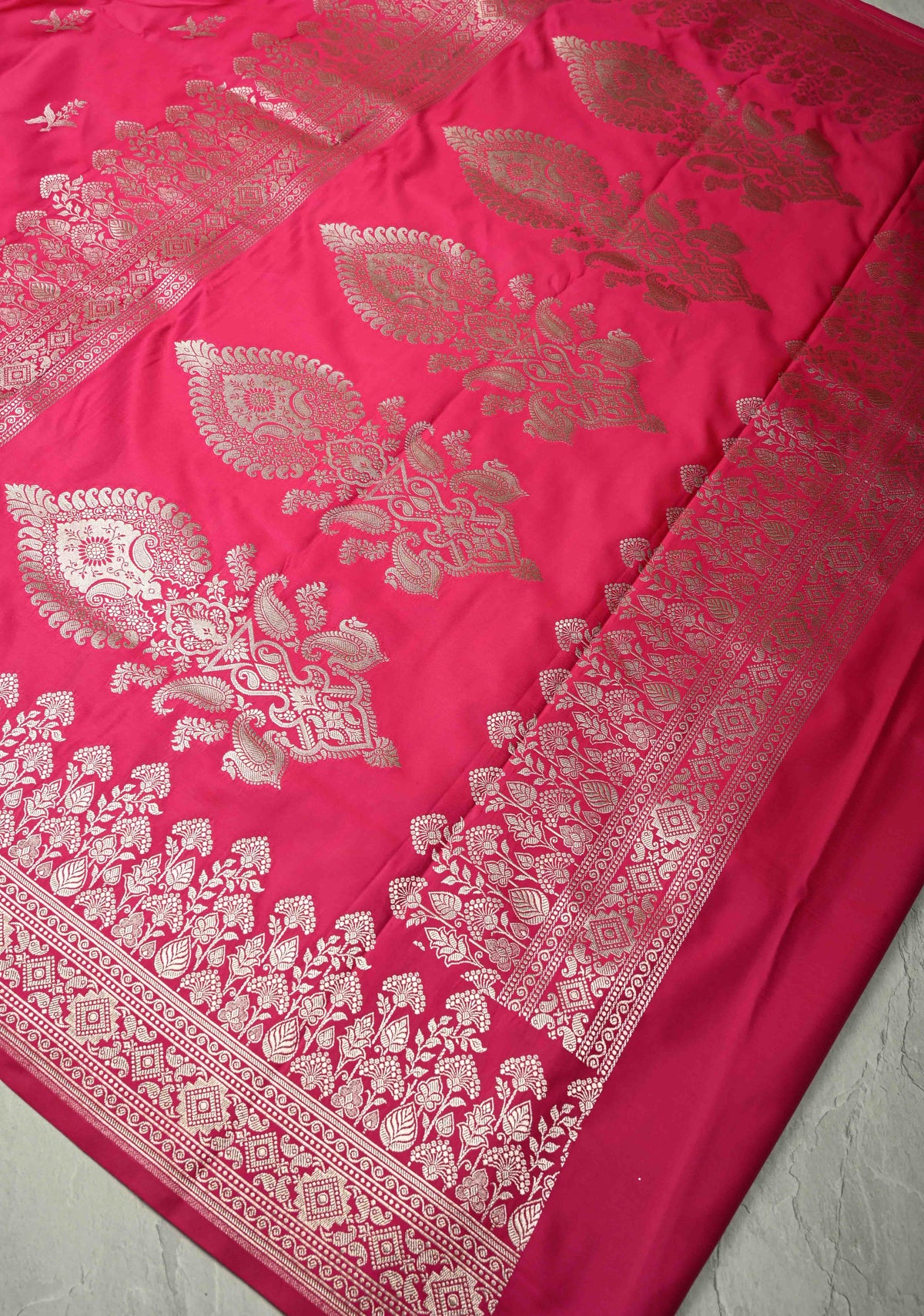 Rani Pink Banarasi Semi Mashru Silk Saree with Floral Silver Zari Buttas and Zari Border | SHOBITAM