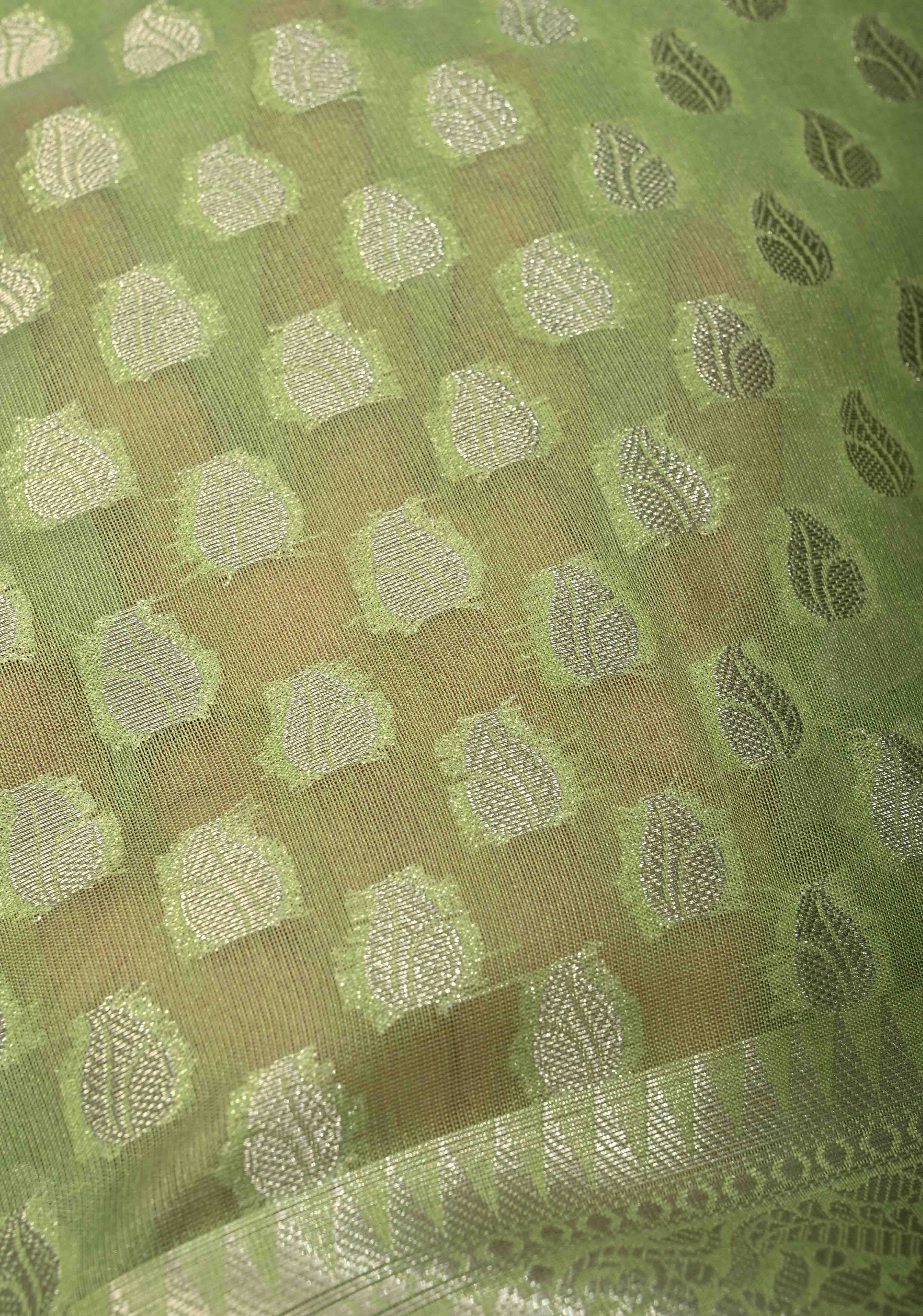Pista Green Banarasi Semi Kora Saree with Silver Zari Buttas and Zari Border | Shobitam