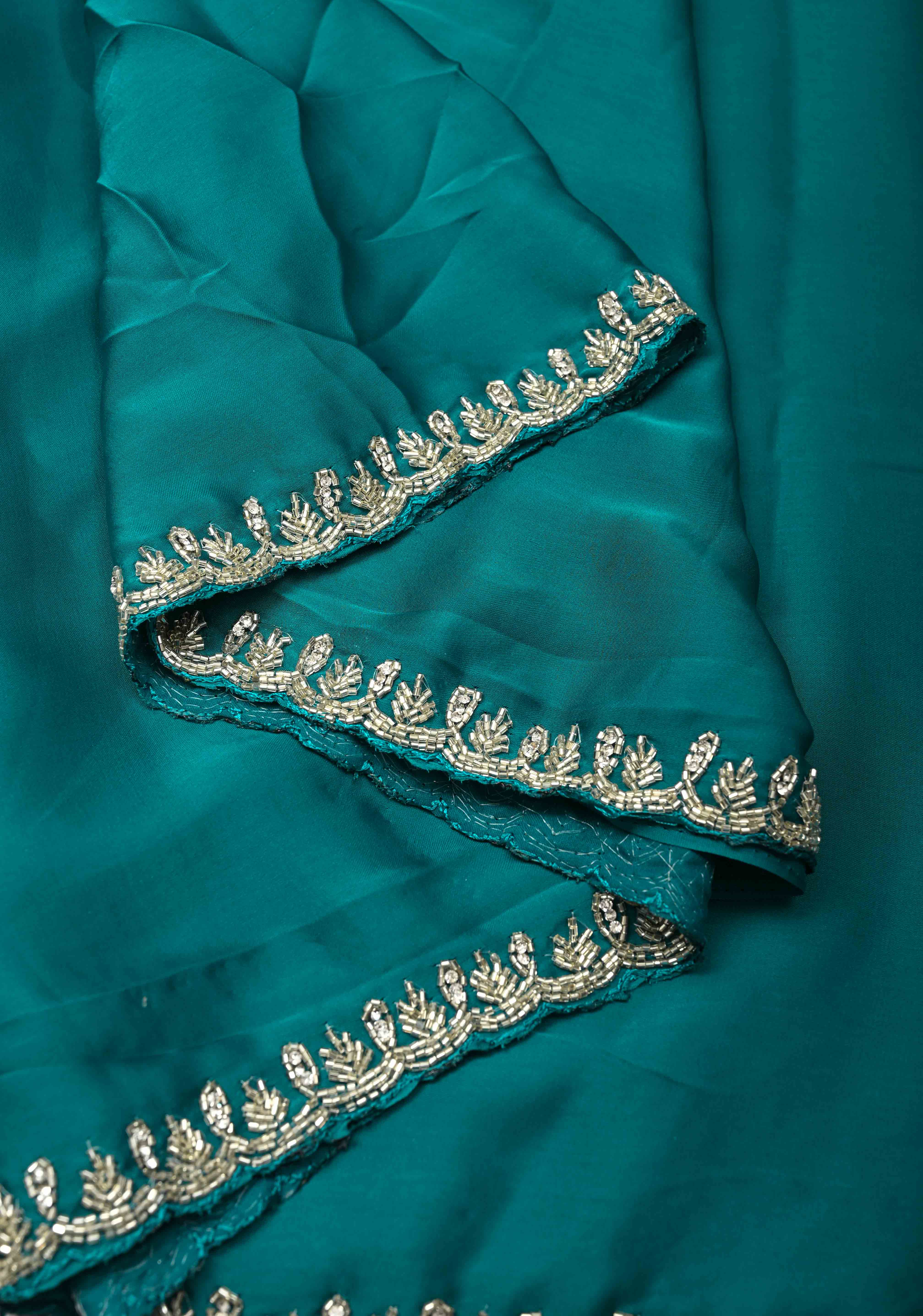 Teal  Satin Geoergette Saree with minimal cutdana borders | Shobitam