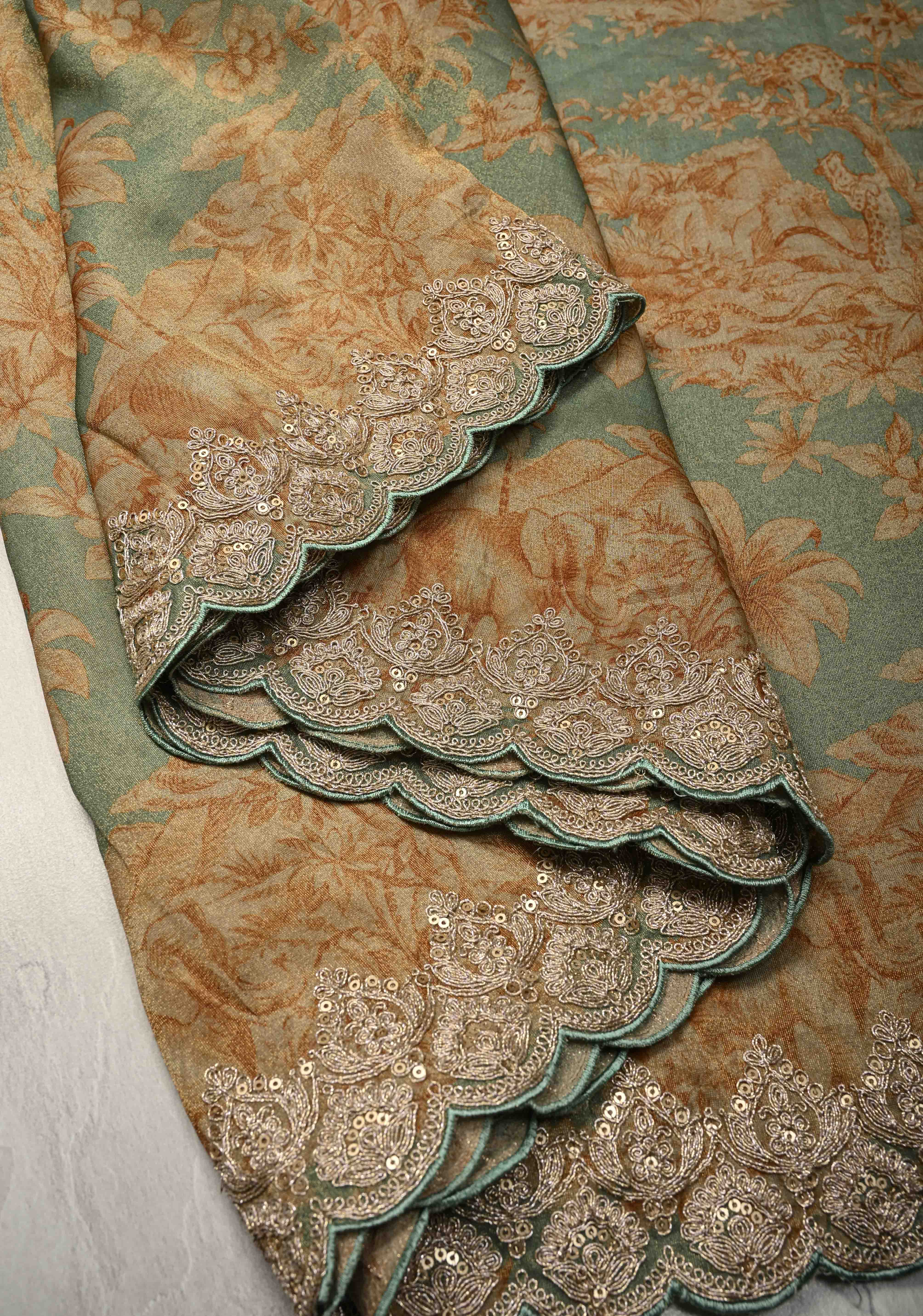 Dusty Sage Green Vegan Silk Viscose Tissue Saree with Printed Floral Pattern and Antique Gold Embroidery Scallop Border | Shobitam