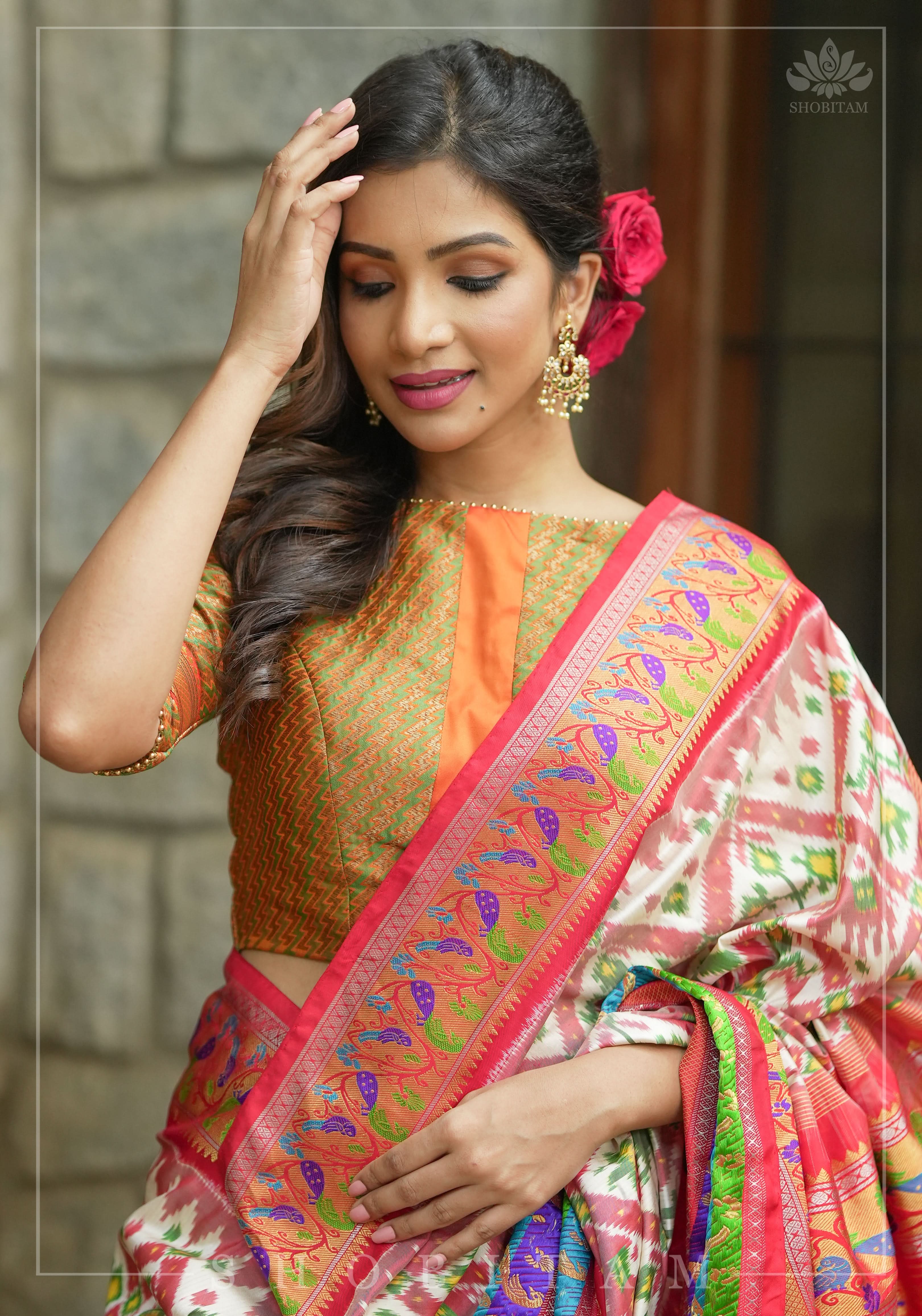 Henna Green and orange Jacquard boatneck blouse with plain silk detailing, Made to Order | Shobitam