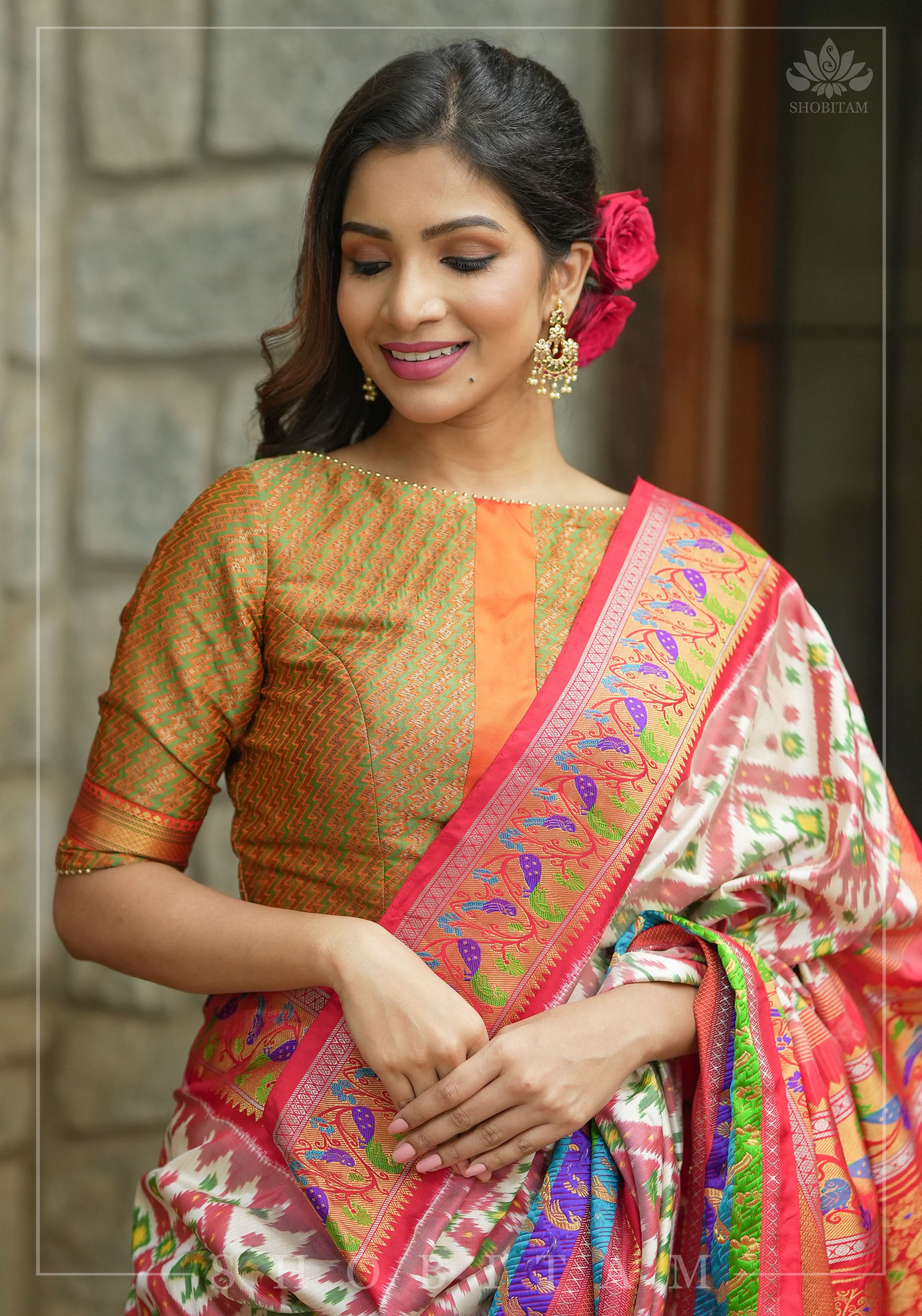 Henna Green and orange Jacquard boatneck blouse with plain silk detailing, Made to Order | Shobitam