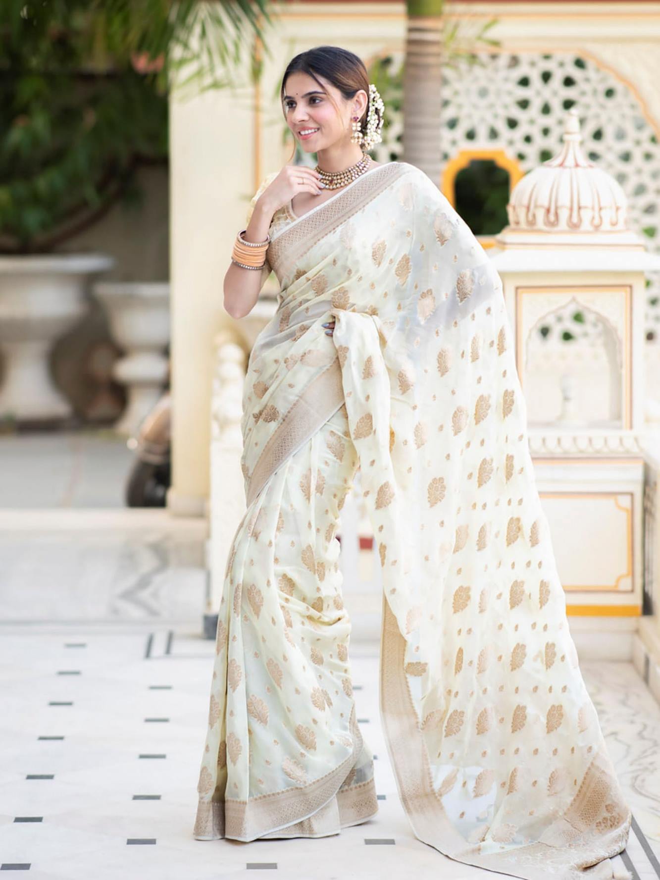 Exquisite  Off white premium Saree with Intricate All-Over Butas and Ornate Palla, Adorned with Luxurious Tassels – A Ready-to-Wear Saree