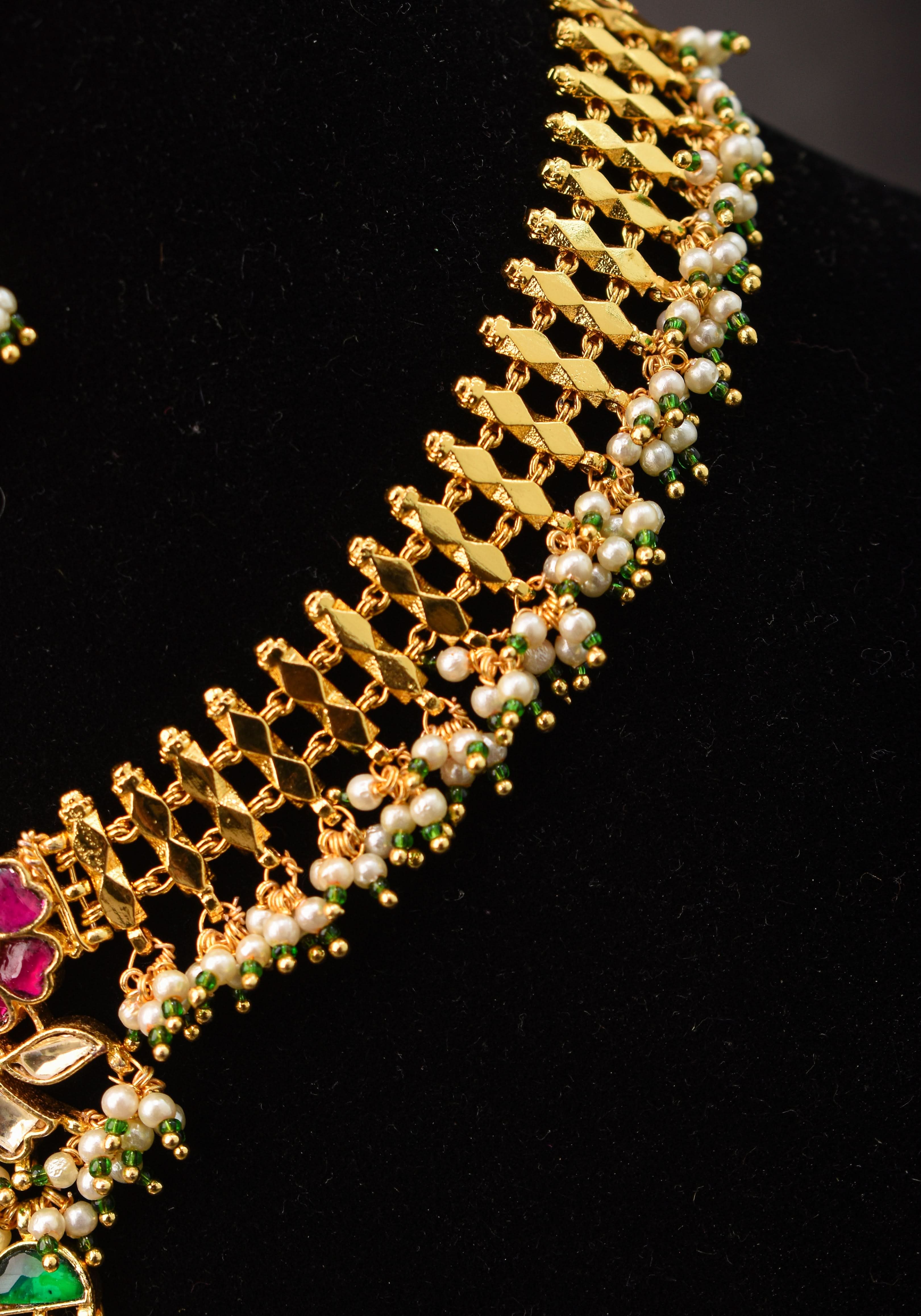 Microplated Gold Tone Flexible Design Choker Set with Floral Jadau center and dangling beads | Shobitam Jewelry
