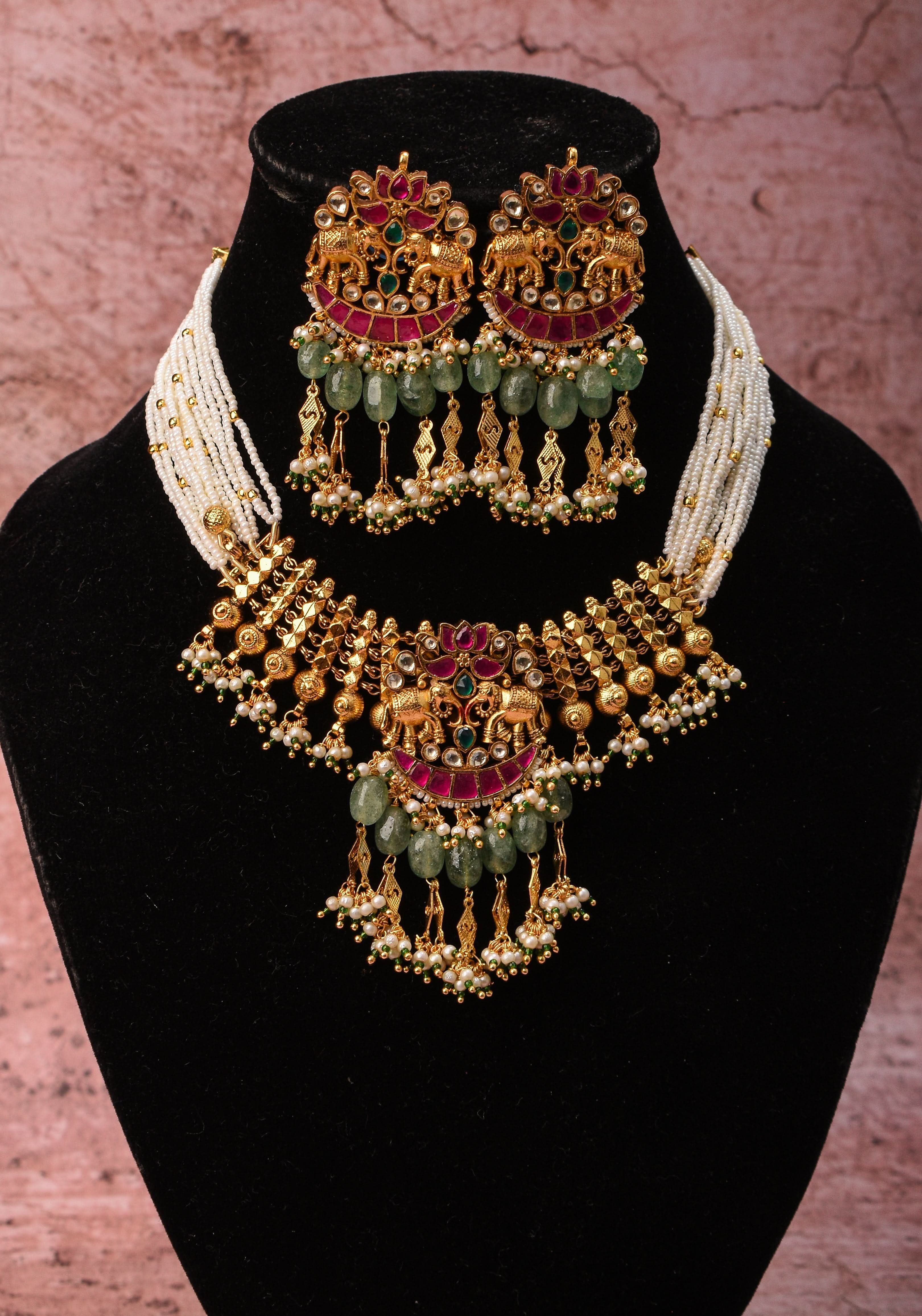 Antique Gold Tone White beads Multistrand Gold Tone Flexible Twin elephant design Simple Necklace Set with sage green dangling beads | SHOBITAM