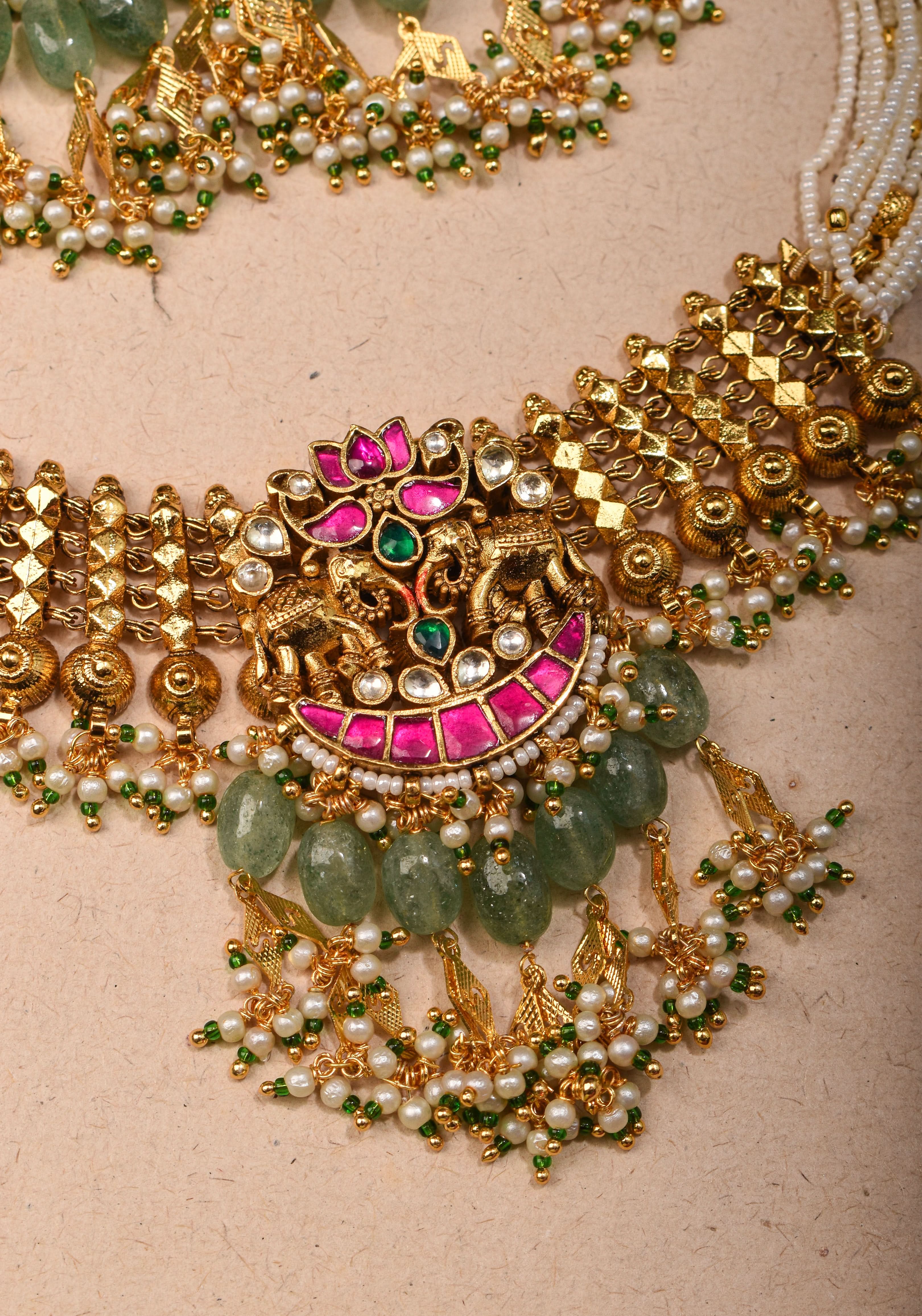 Antique Gold Tone White beads Multistrand Gold Tone Flexible Twin elephant design Simple Necklace Set with sage green dangling beads | SHOBITAM