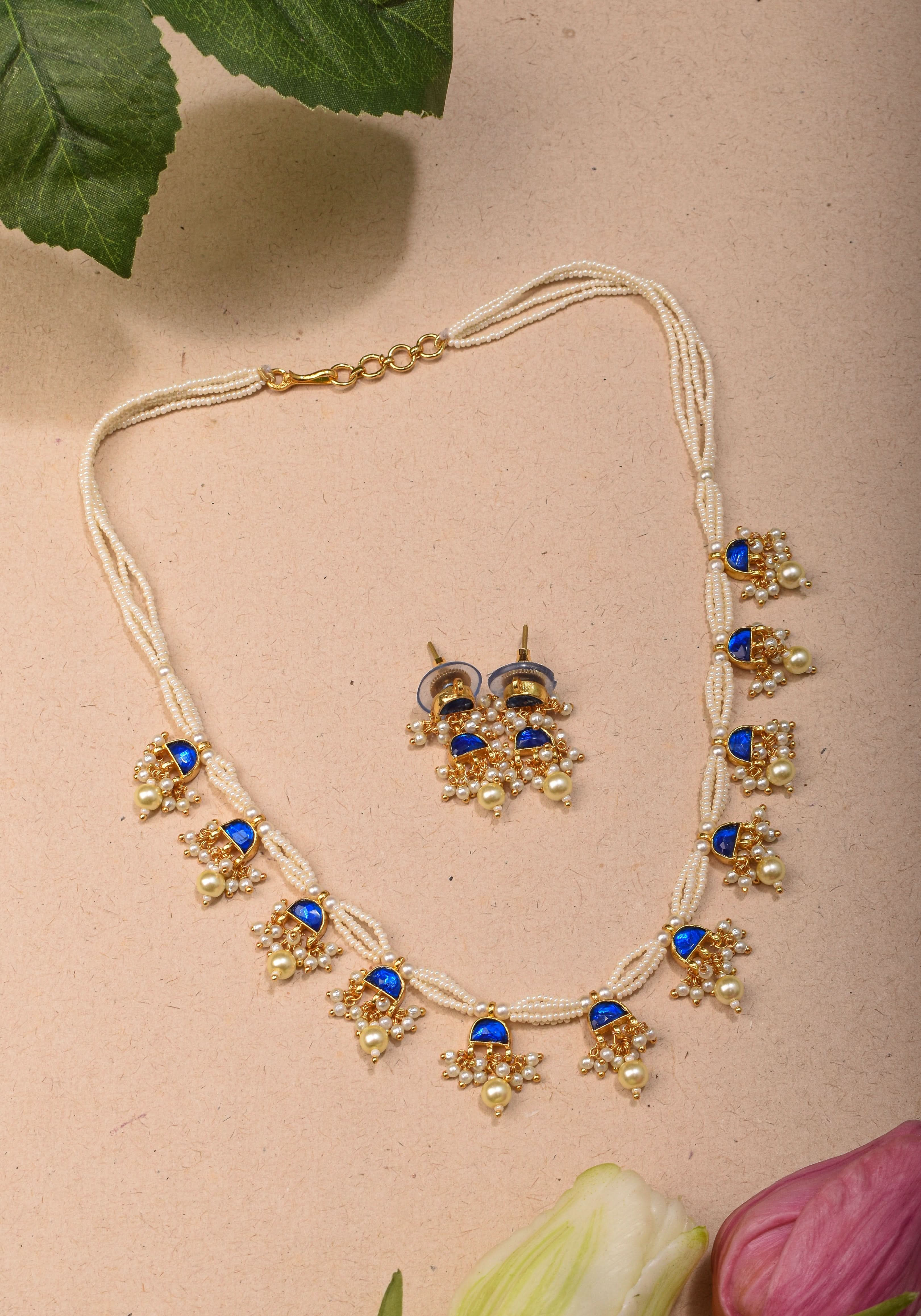 Lightweight Jadau Necklace Set with eleven dangling royal blue stones and matching earrings | Shobitam Jewelry