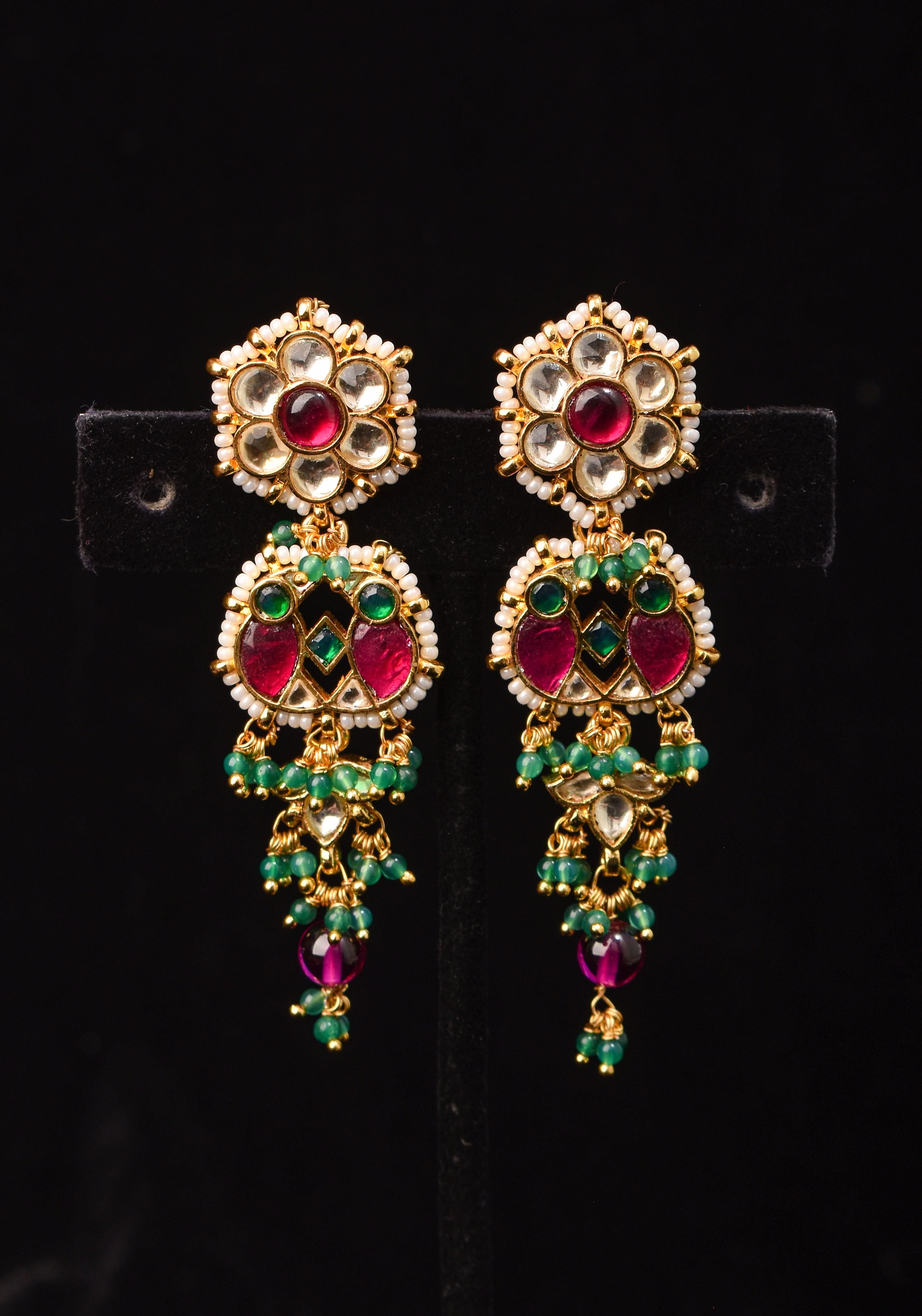 Earrings with flower  embedded in Jadau technique and dangling beads | SHOBITAM
