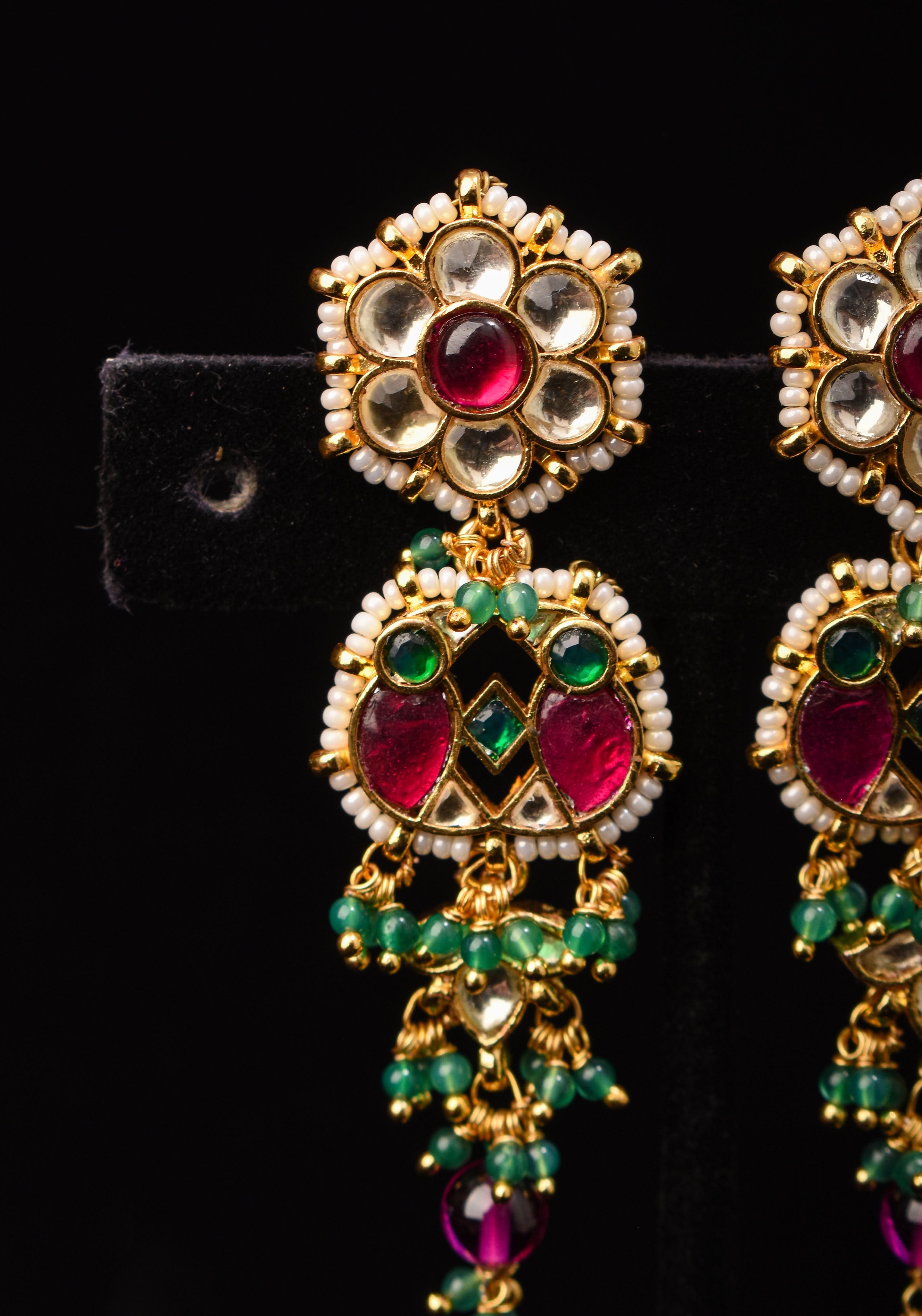 Earrings with flower  embedded in Jadau technique and dangling beads | SHOBITAM
