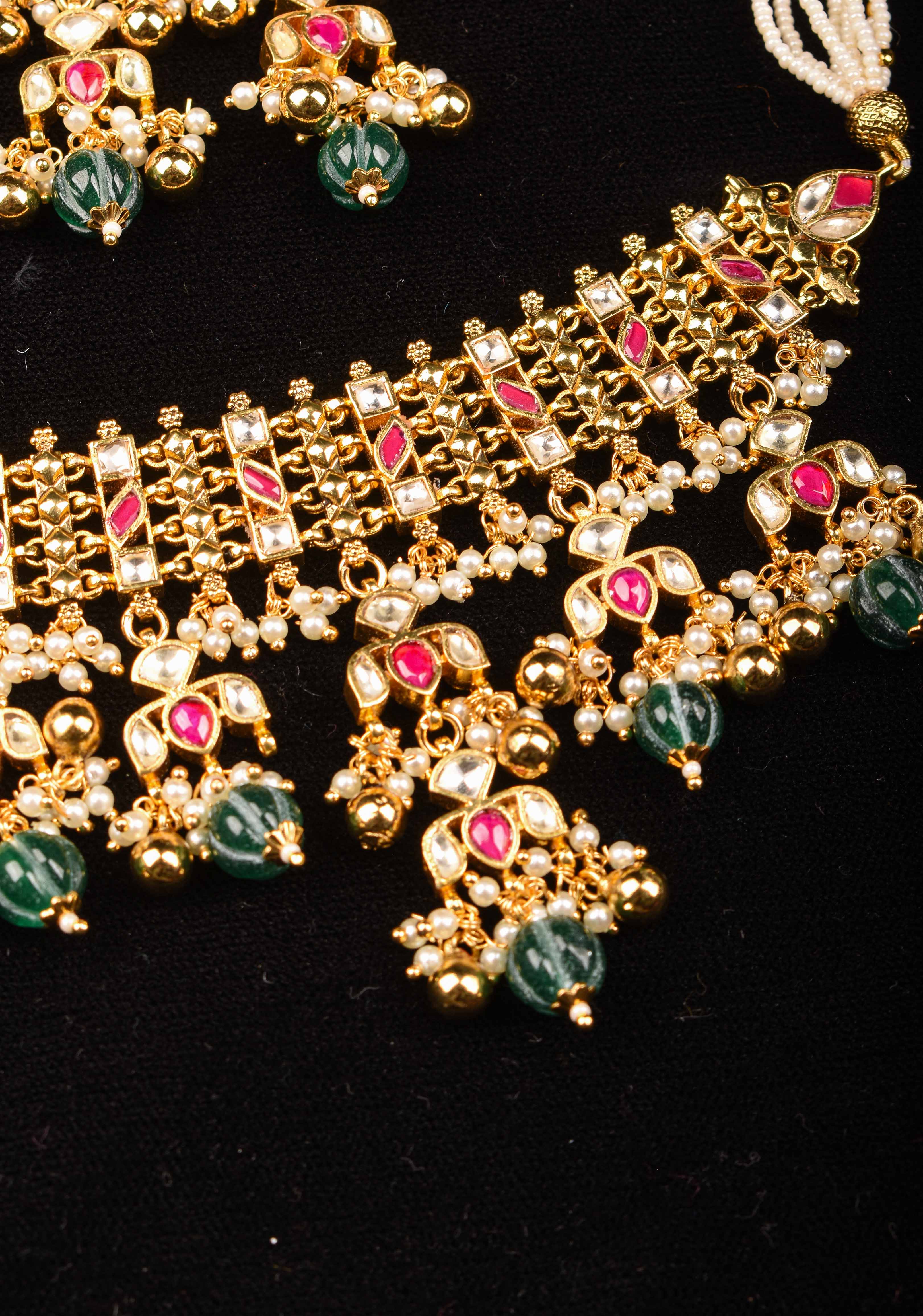 Antique Multistrand Gold Tone Flexible Floral design Simple Necklace Set with green dangling beads | Shobitam