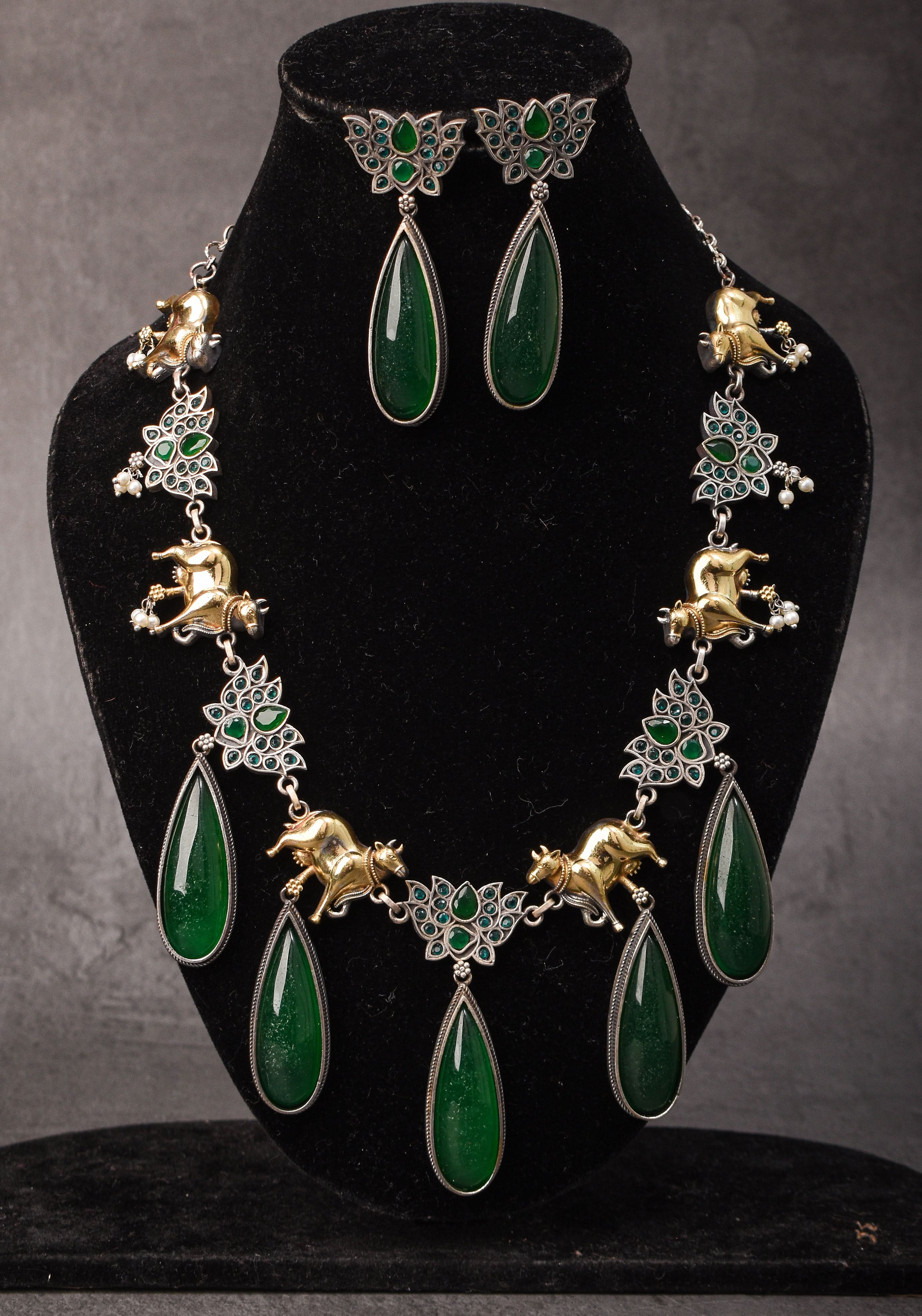 Fusion Dual Tone Jewelry with Pichwai Cow units and Green stones | Shobitam Jewelry