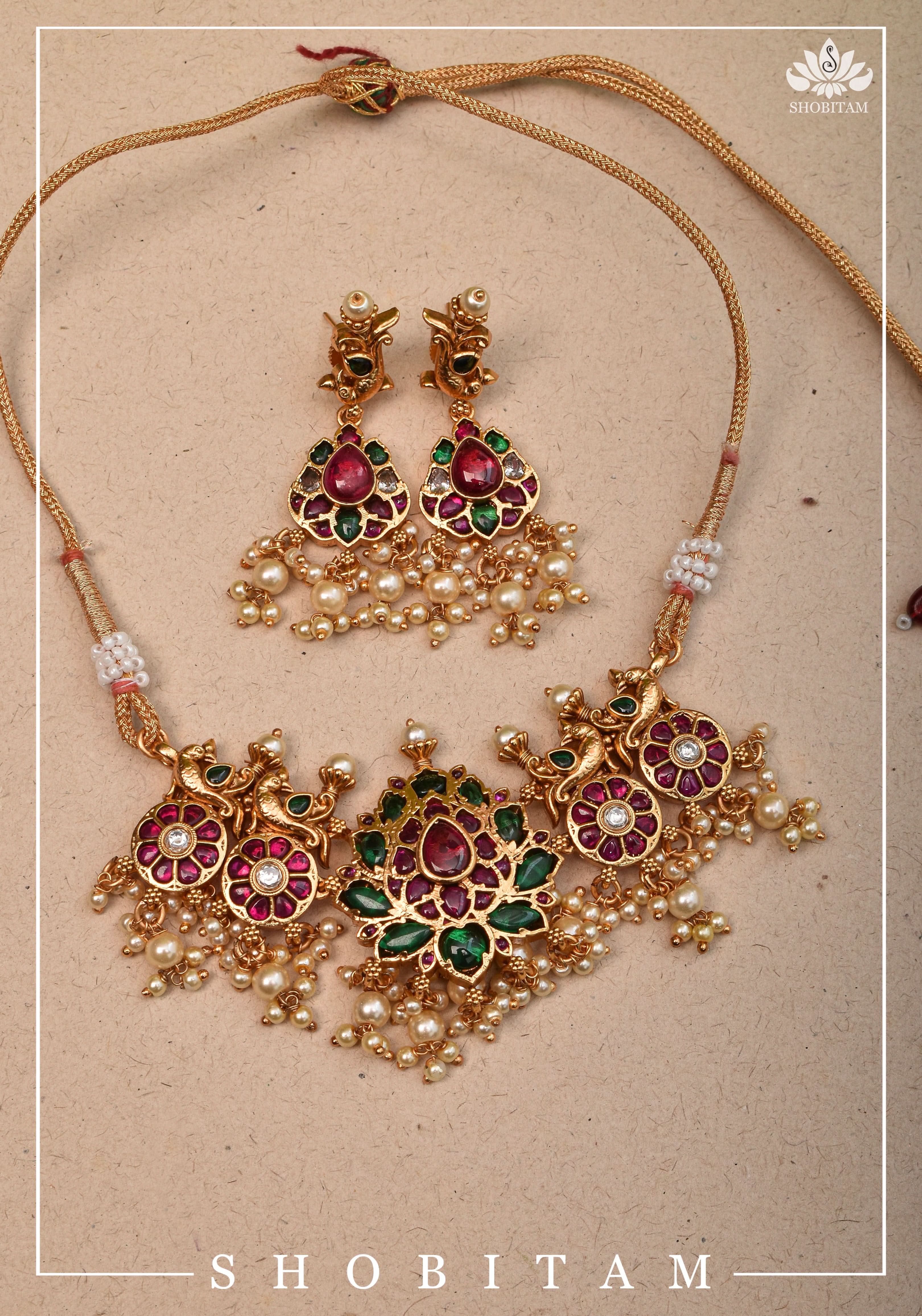 Jadau Lotus Stone Embellishment with Peacock units Choker Set In Green,Pink and white With Matching Earrings | Shobitam