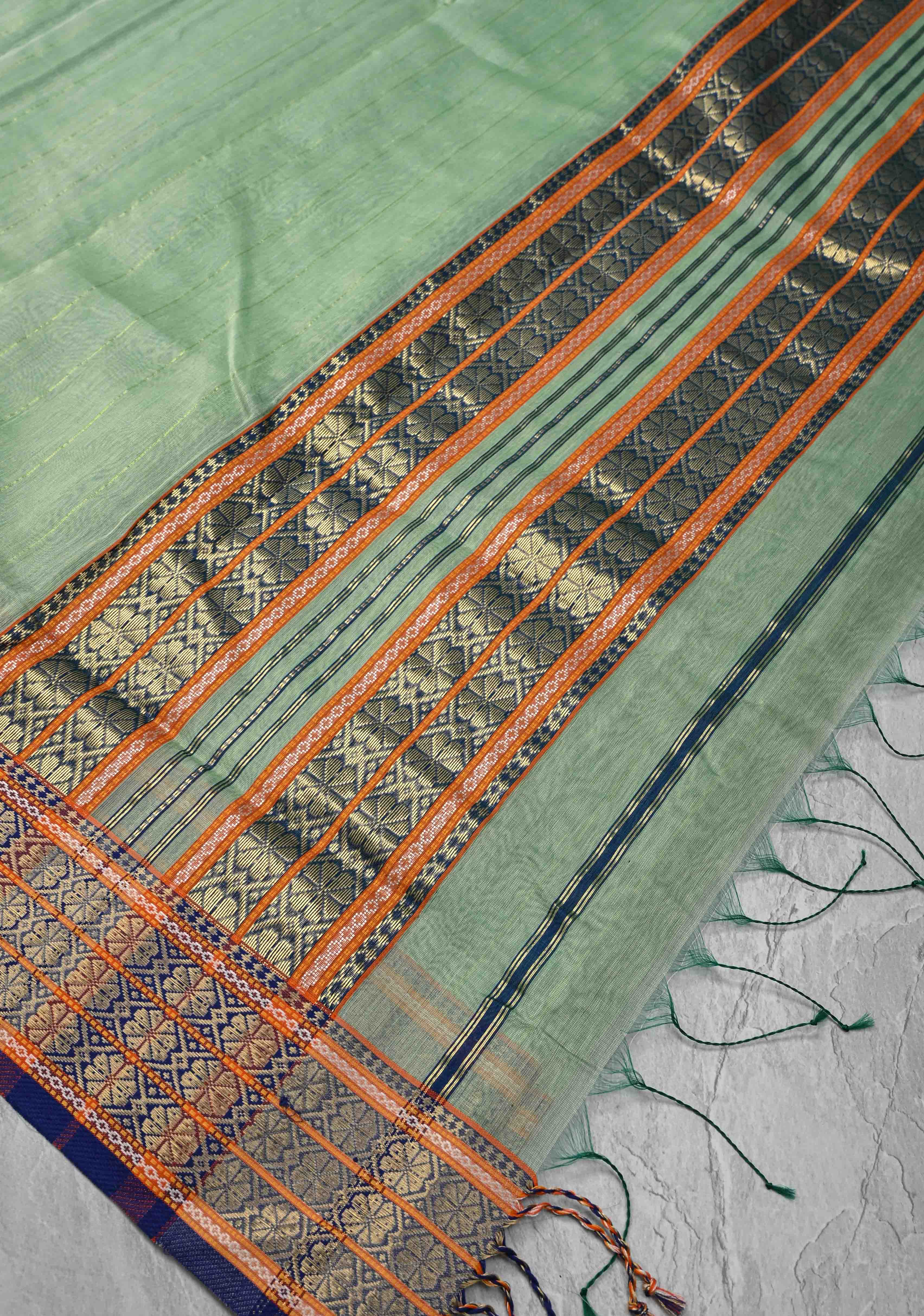 Mint Green Handwoven Maheshwari Silk Cotton Saree with Muted Stripes And Zari Border | Shobitam