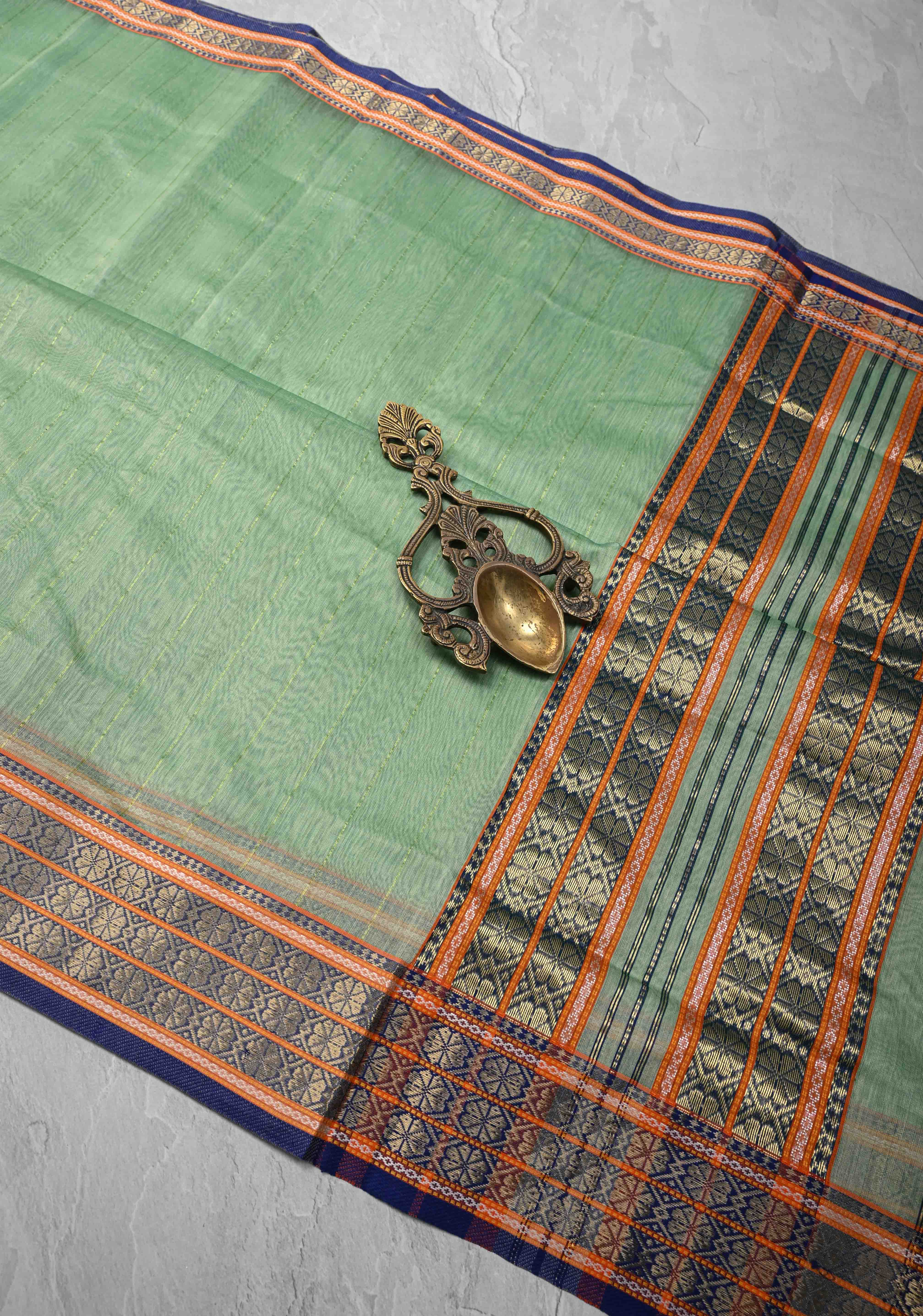 Mint Green Handwoven Maheshwari Silk Cotton Saree with Muted Stripes And Zari Border | Shobitam