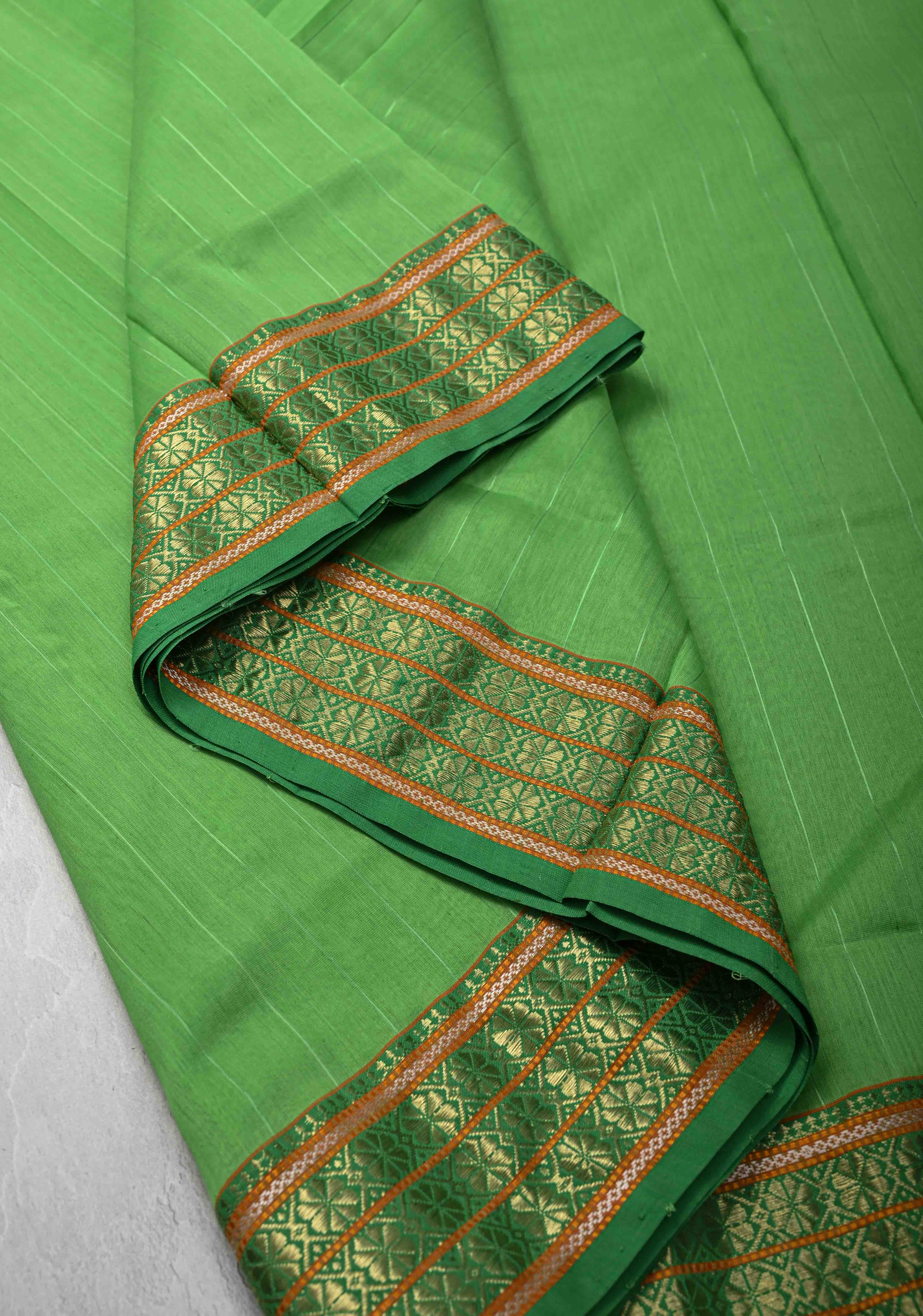 Parrot Green Handwoven Maheshwari Silk Cotton Saree with Muted Stripes and Zari Borders | Shobitam