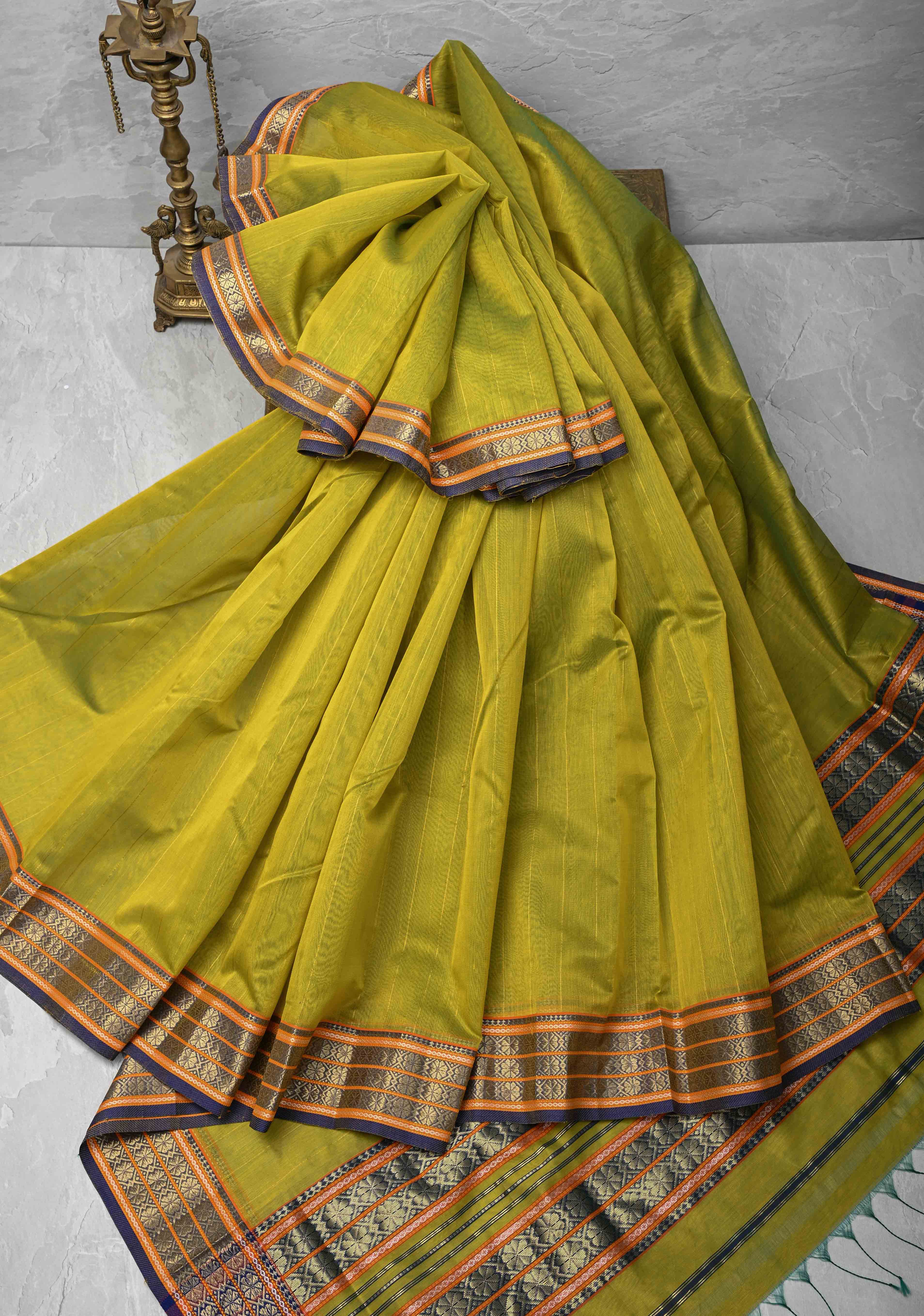 Lime Green Handwoven Maheshwari Silk Cotton Saree with Muted Stripes and Zari Borders | Shobitam
