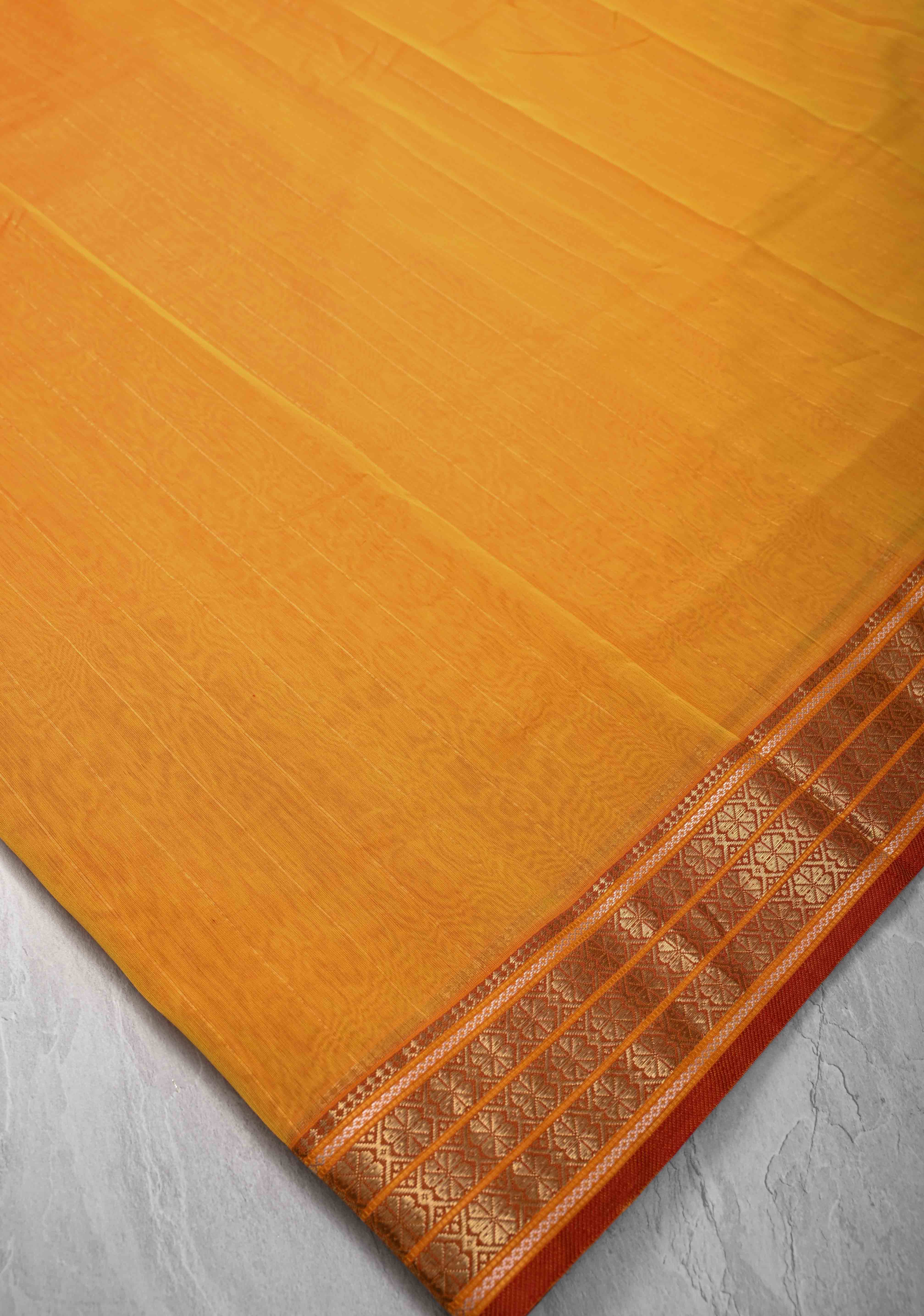 Mustard Yellow Handwoven Maheshwari Silk Cotton Saree with Muted Stripes and Zari Borders | Shobitam