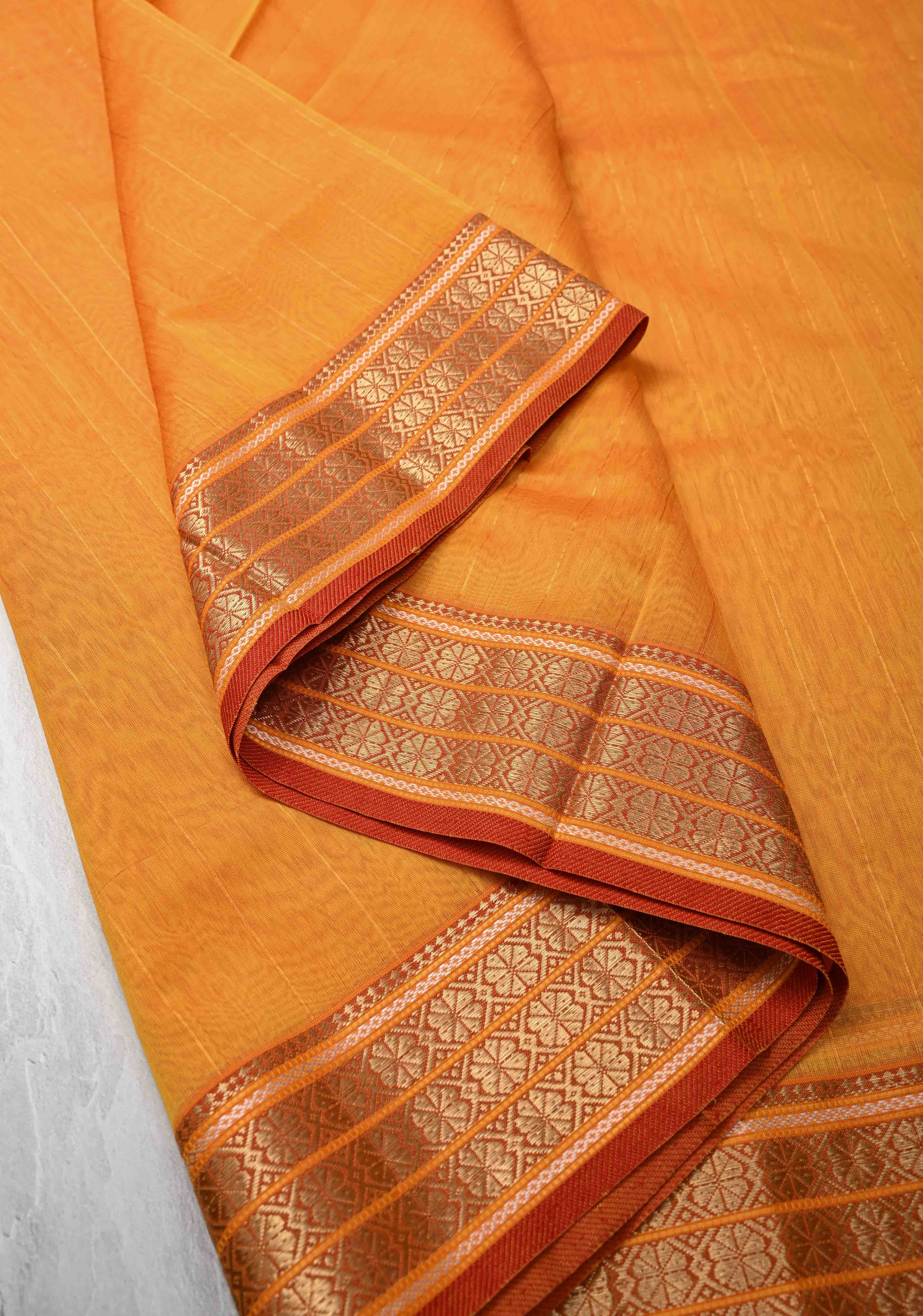 Mustard Yellow Handwoven Maheshwari Silk Cotton Saree with Muted Stripes and Zari Borders | Shobitam