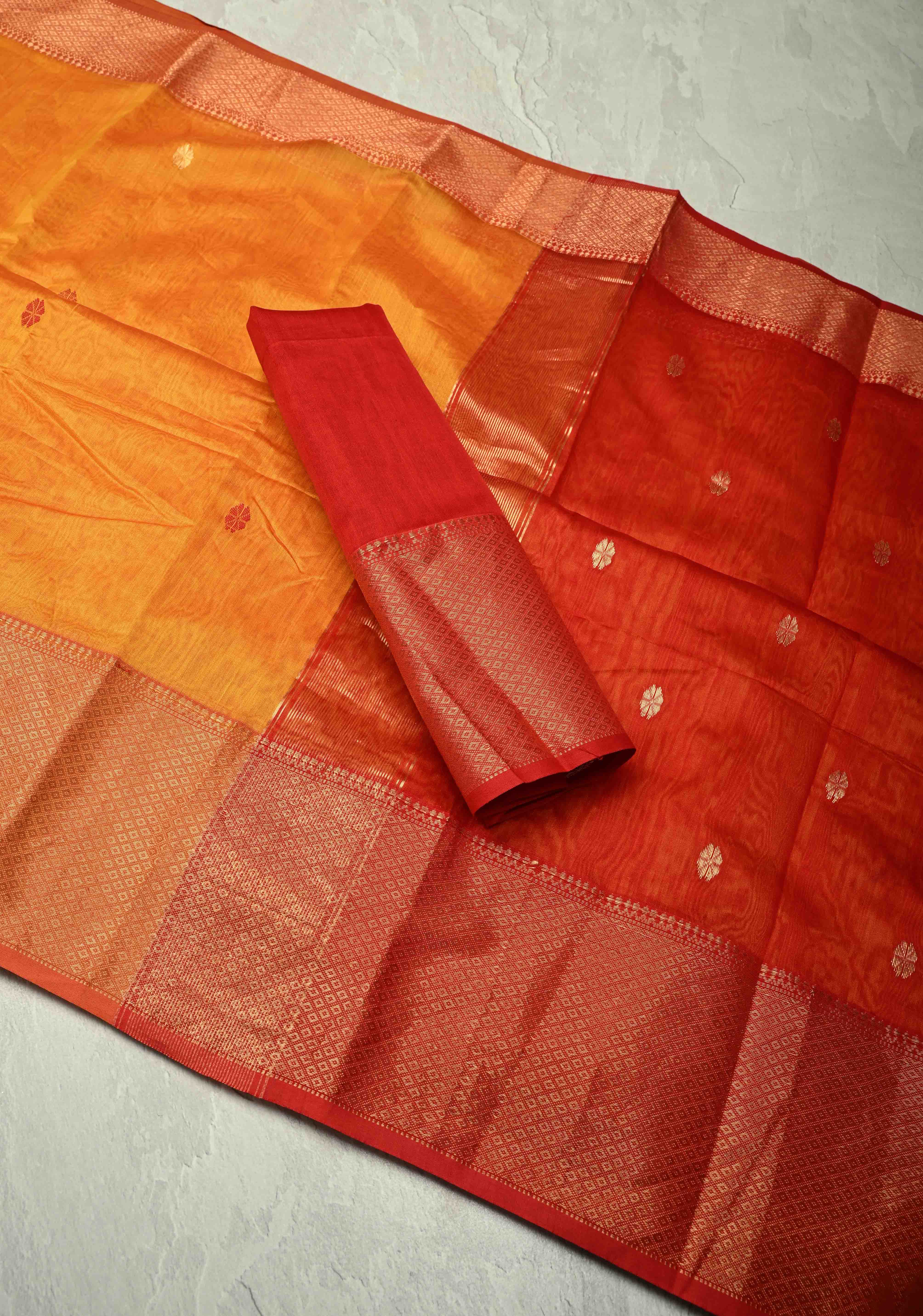Yellowish Orange Dual Tone Handwoven Maheshwari Silk Cotton Saree with Resham Buttas and Contrast Border