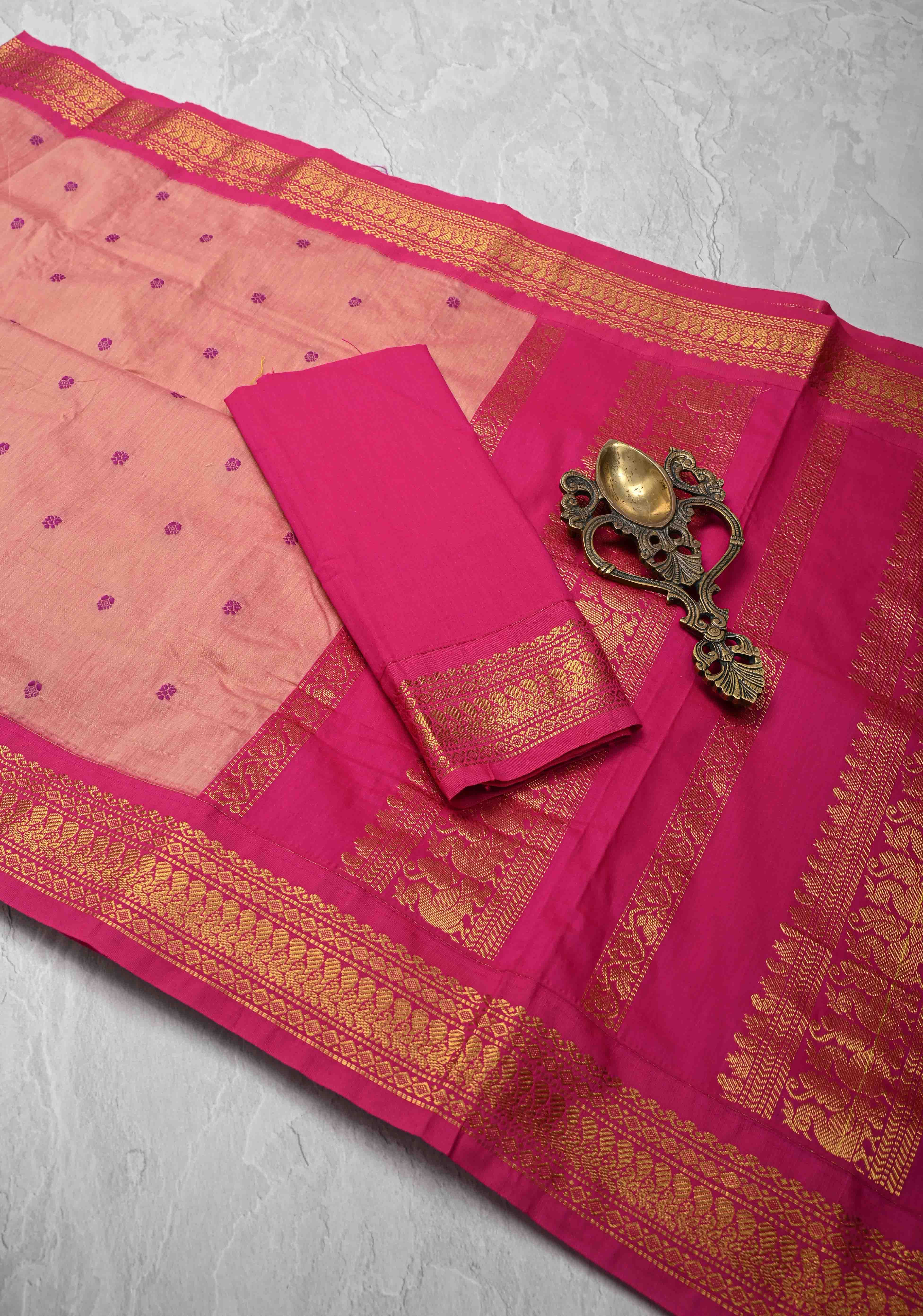 Peach Orange Venkatagiri Cotton Silk Saree with Thread buttas and Red zari borders | Shobitam