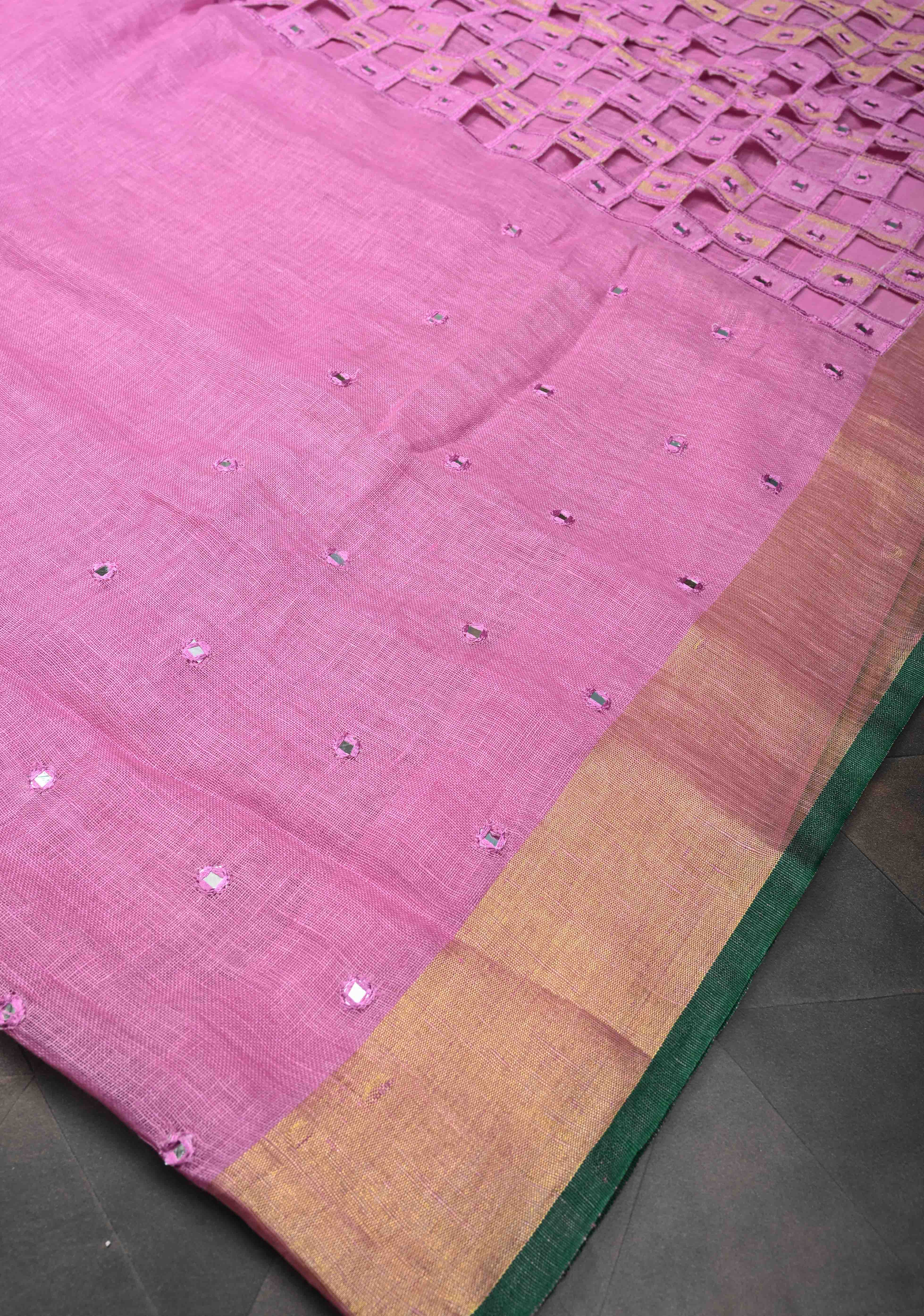 Jaali Pallu - Linen by Linen Cutwork and Mirrorwork Saree in Pink and Zari Border