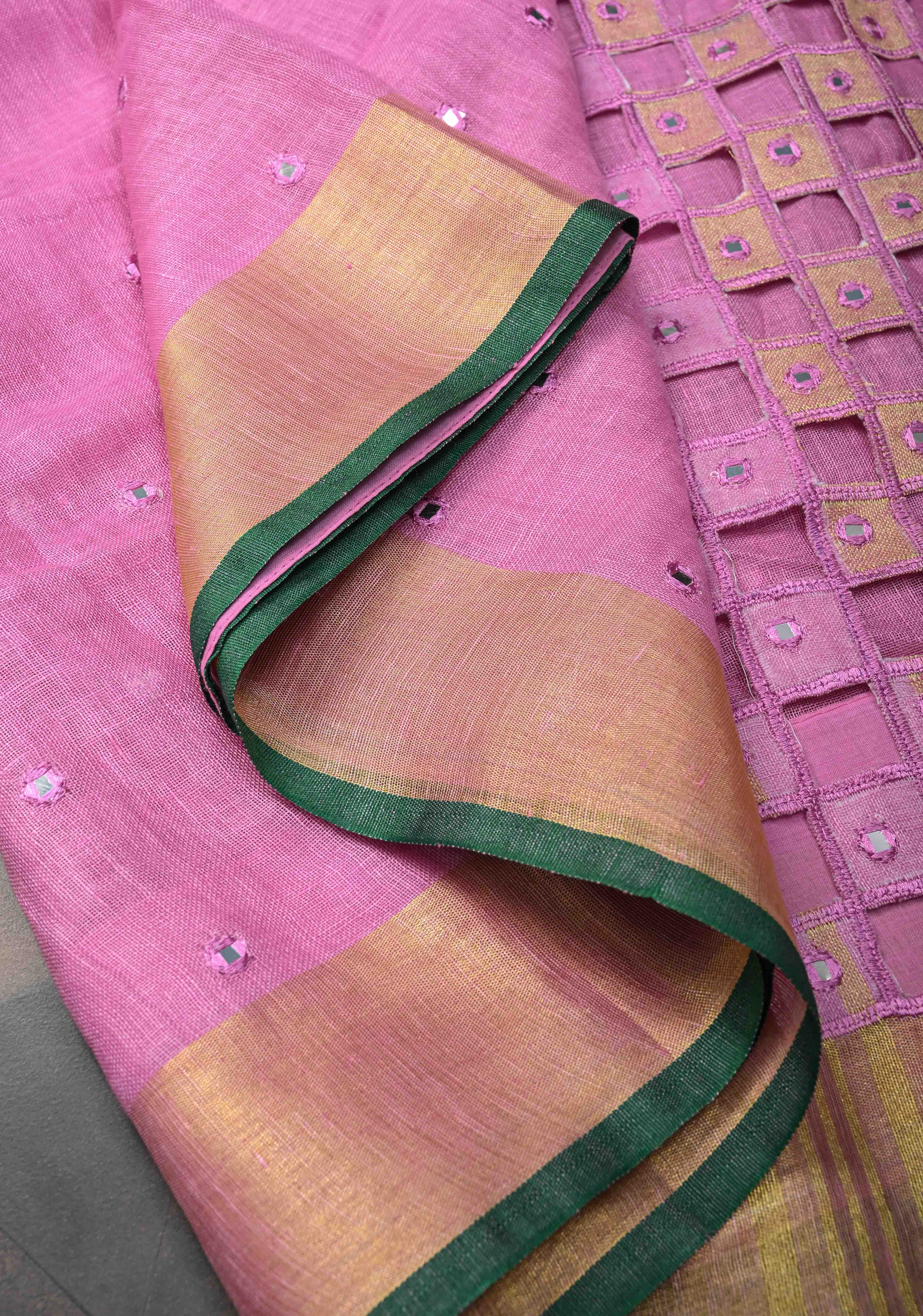 Jaali Pallu - Linen by Linen Cutwork and Mirrorwork Saree in Pink and Zari Border