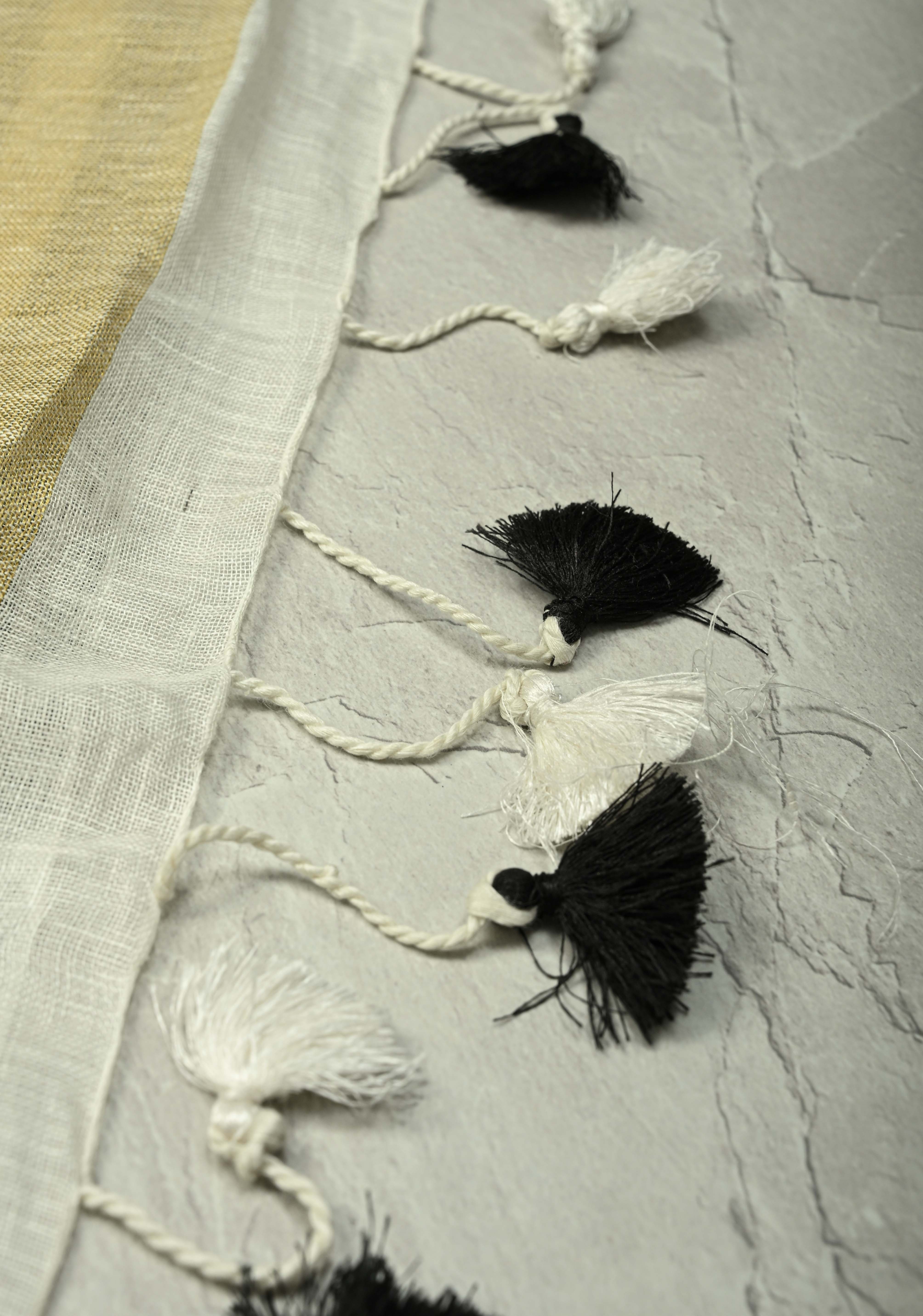 Black-White Linen Saree with Vertical Stripes and Tissue Zari Border | Shobitam