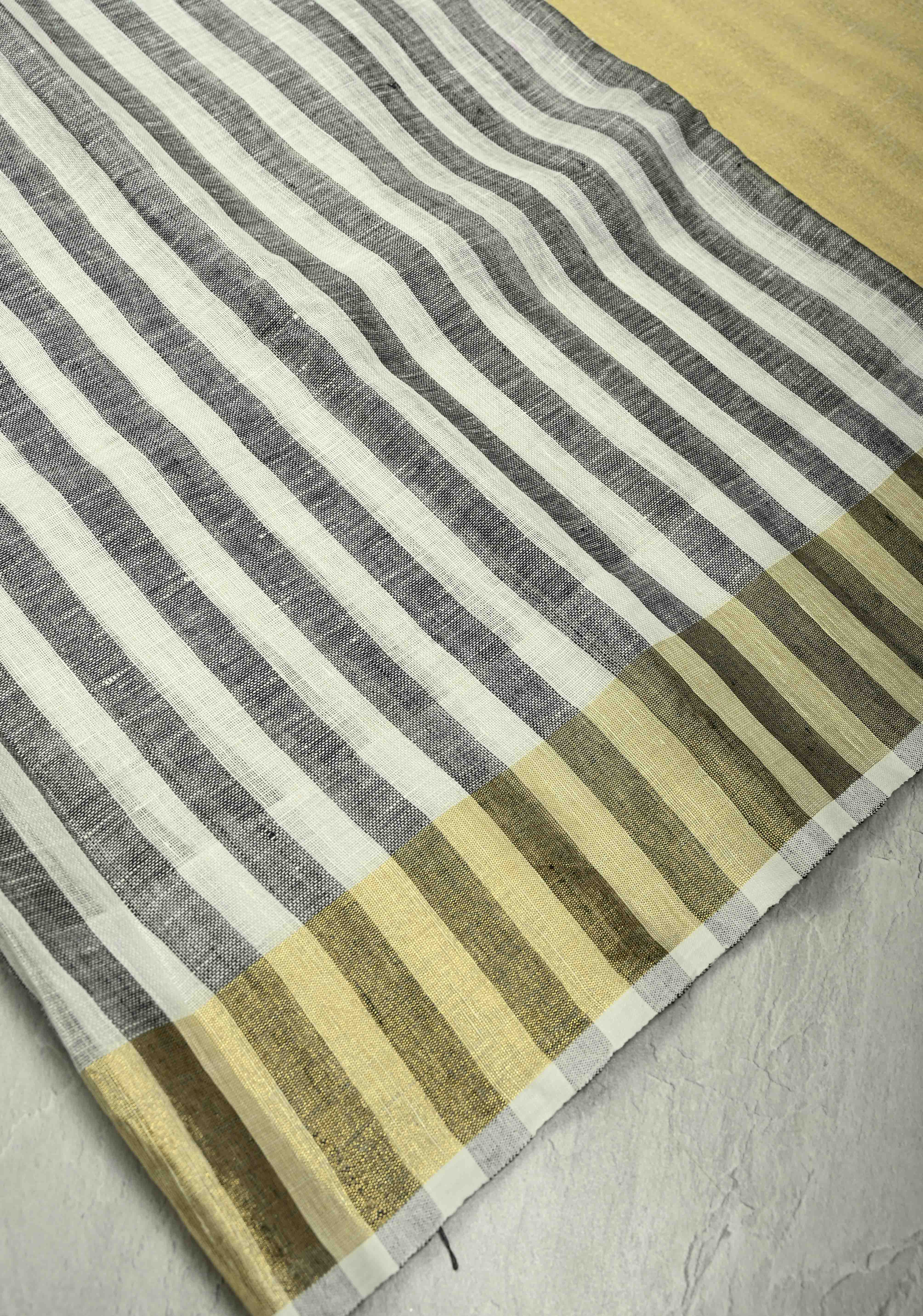Black-White Linen Saree with Vertical Stripes and Tissue Zari Border | Shobitam