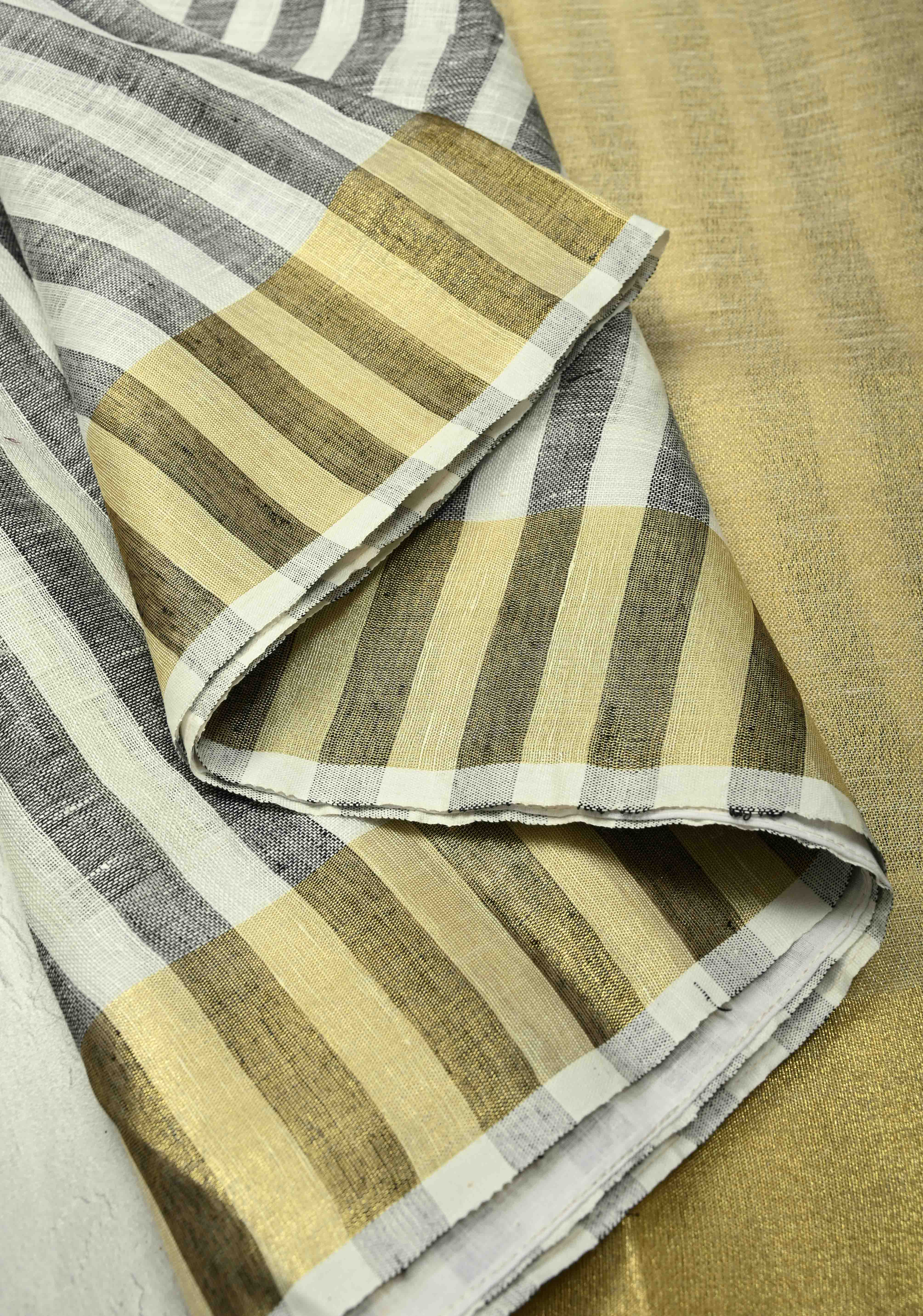 Black-White Linen Saree with Vertical Stripes and Tissue Zari Border | Shobitam