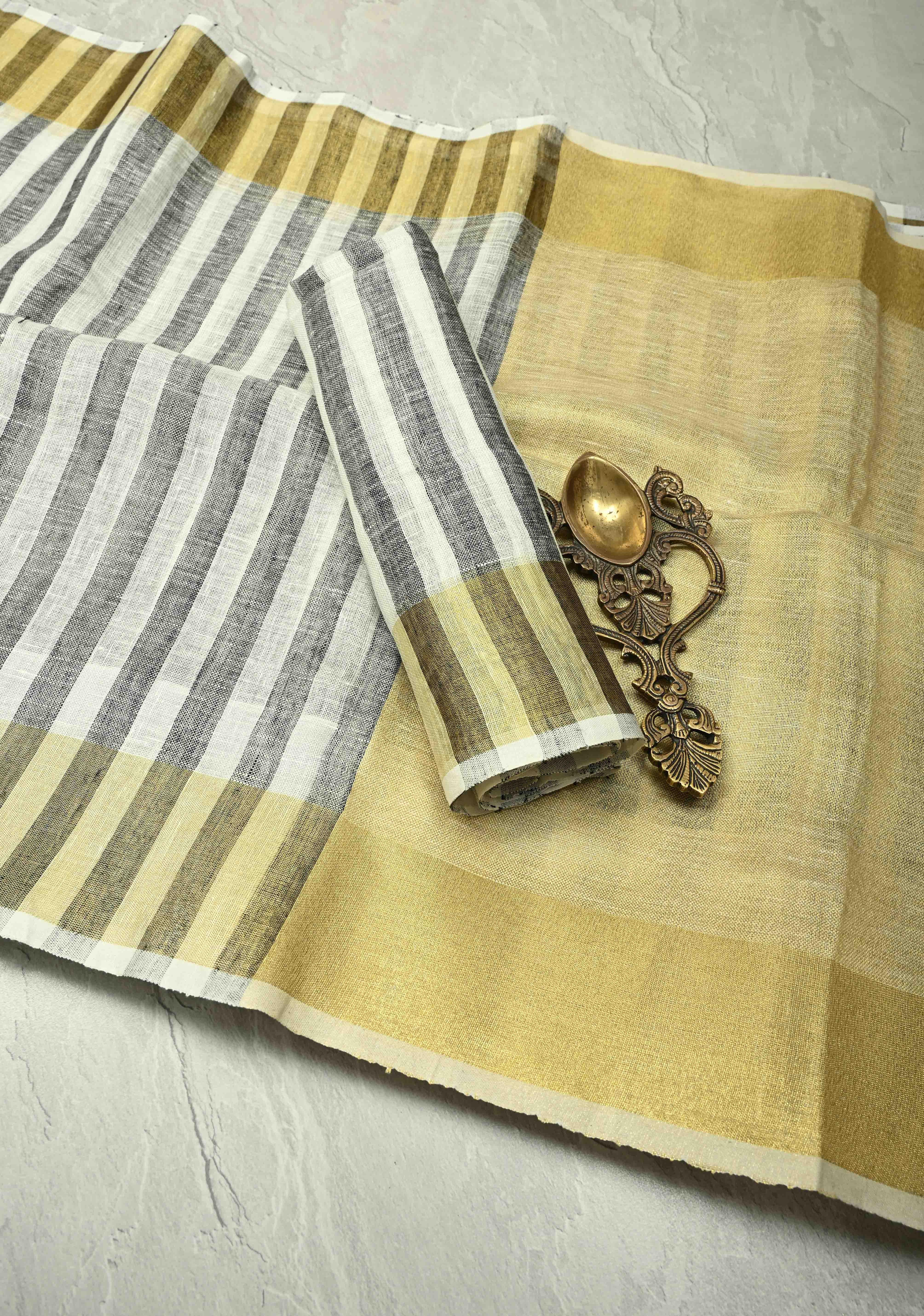 Black-White Linen Saree with Vertical Stripes and Tissue Zari Border | Shobitam