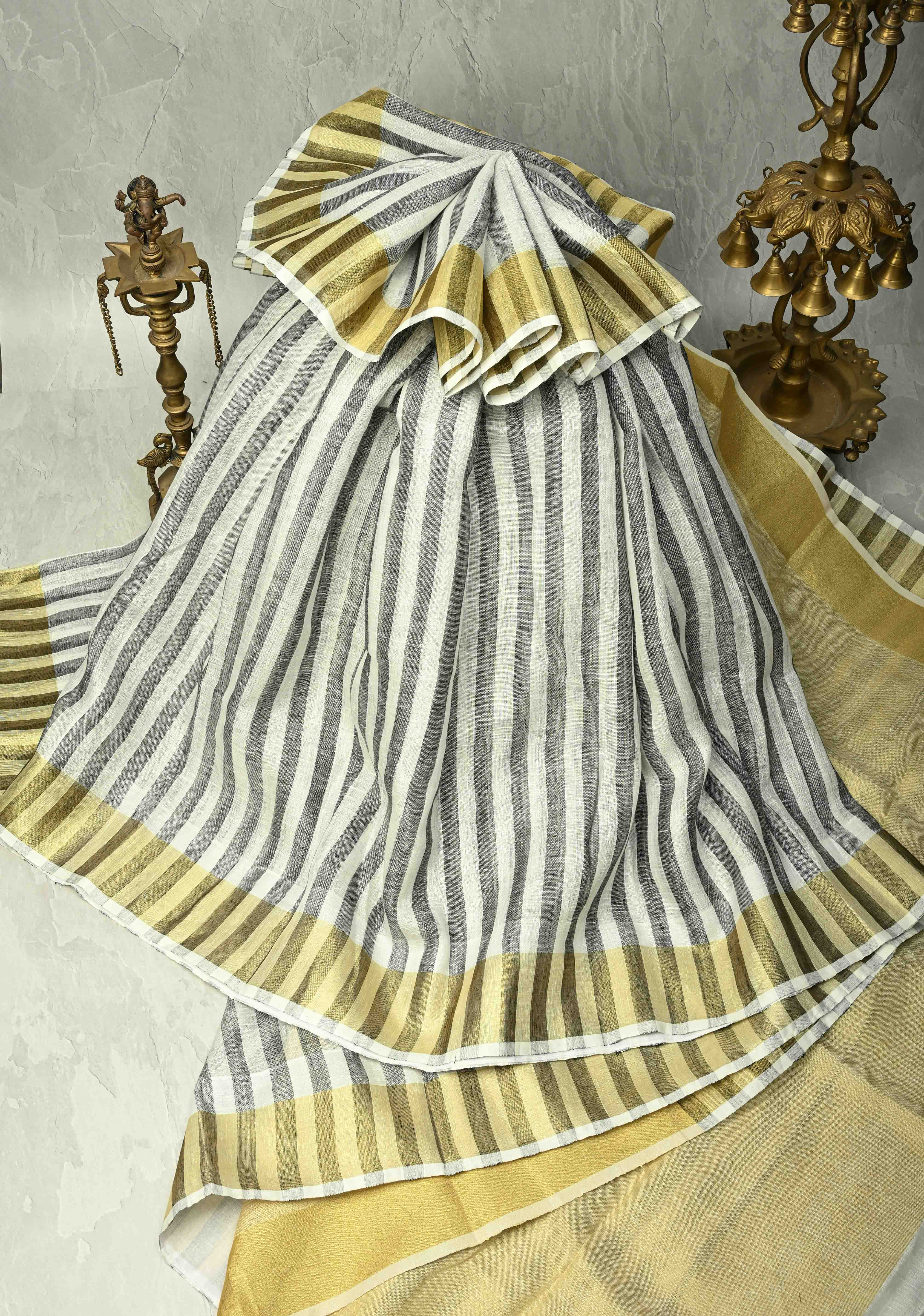 Black-White Linen Saree with Vertical Stripes and Tissue Zari Border | Shobitam