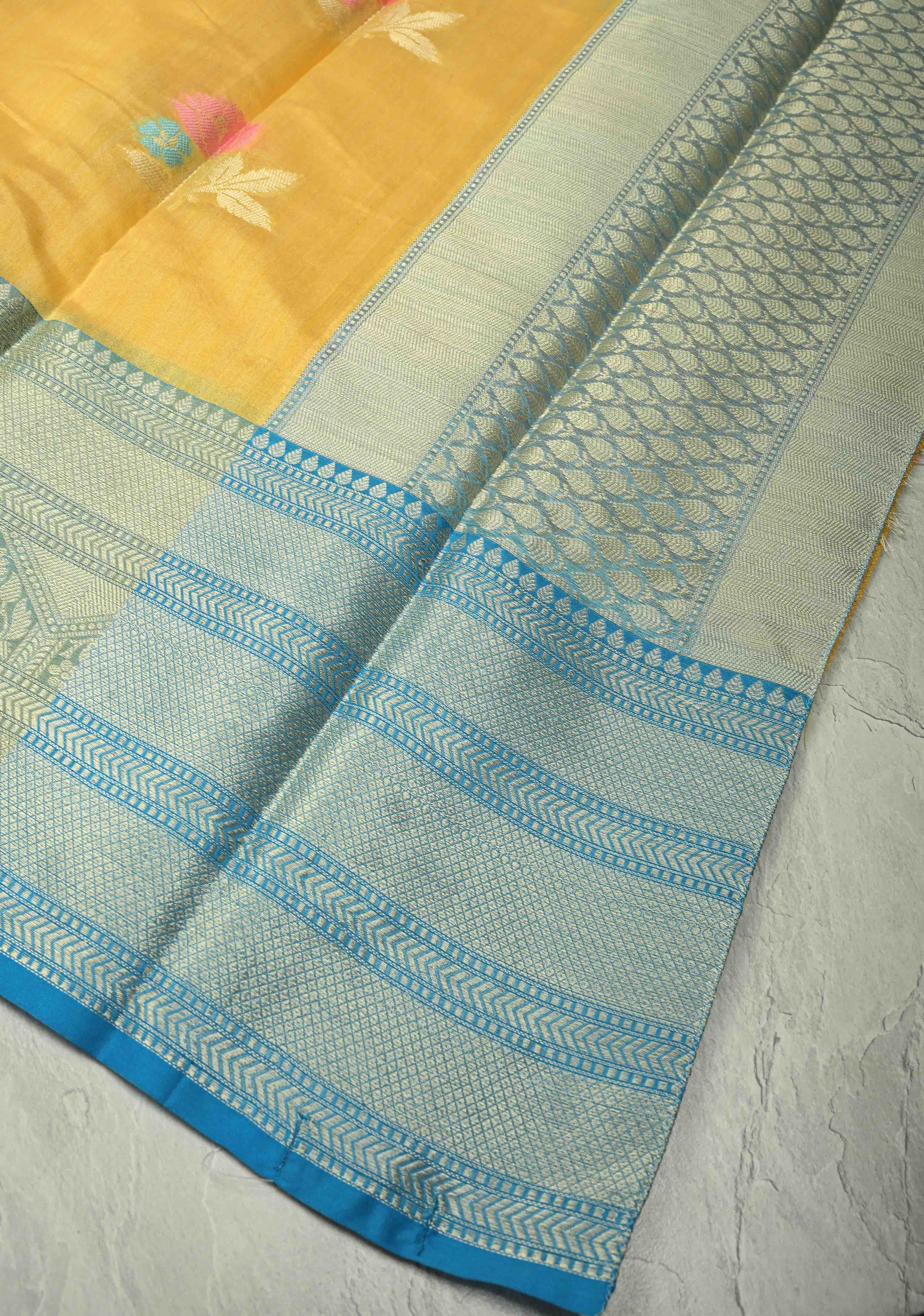 Mango Yellow Banarasi Semi Kora Saree with Meenakari Floral Buttas and Contrast Wide Zari Border | Shobitam